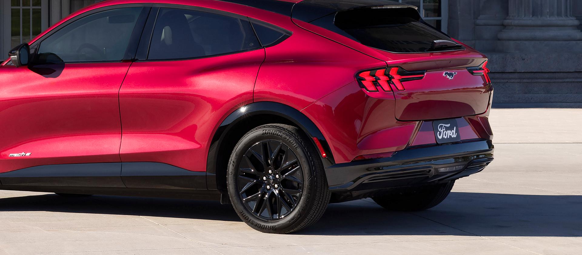 2025 Ford Mustang Mach-E® parked and highlighting the rear taillights