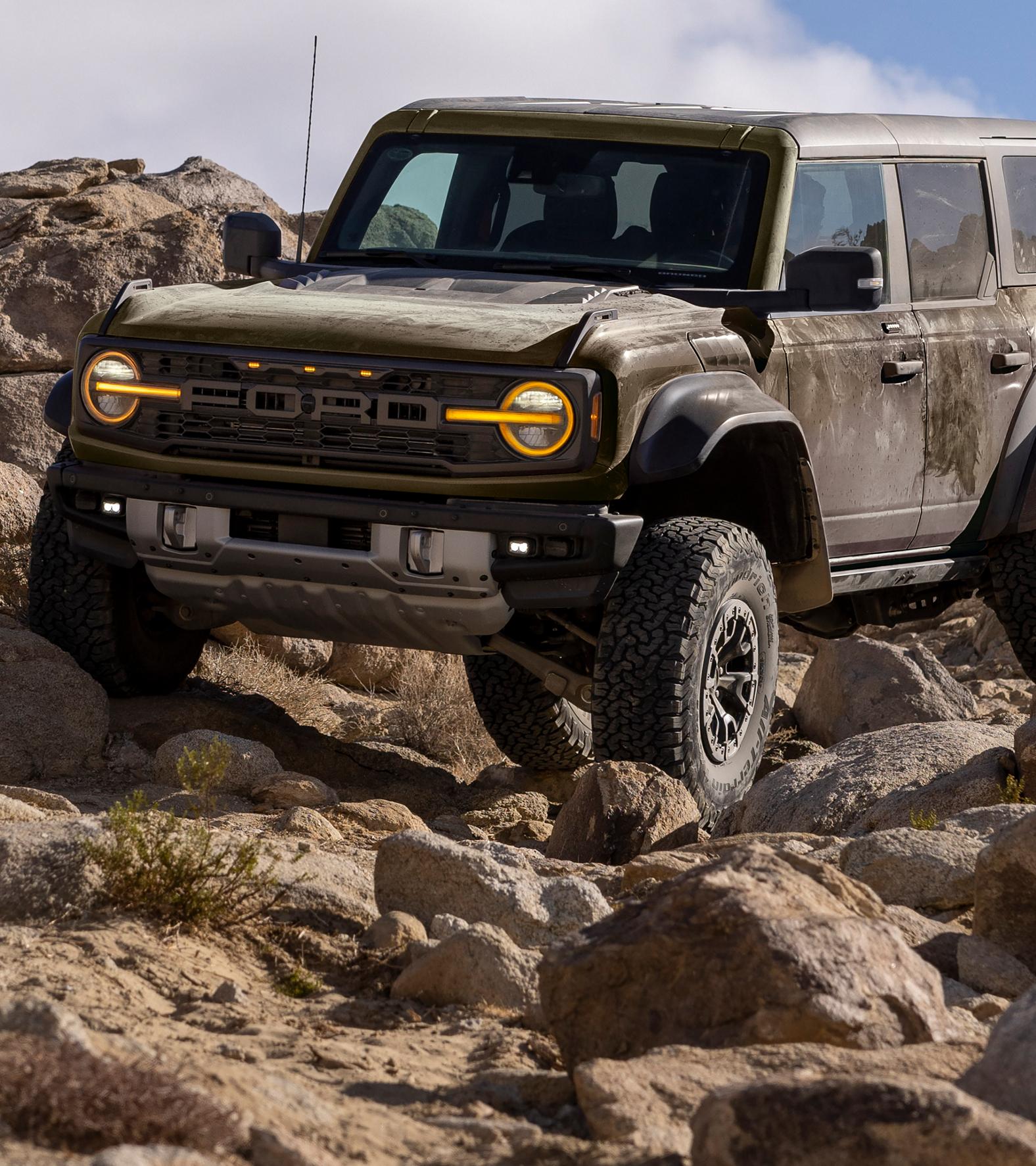 A 2025 Ford Bronco® SUV rock-crawling in the desert