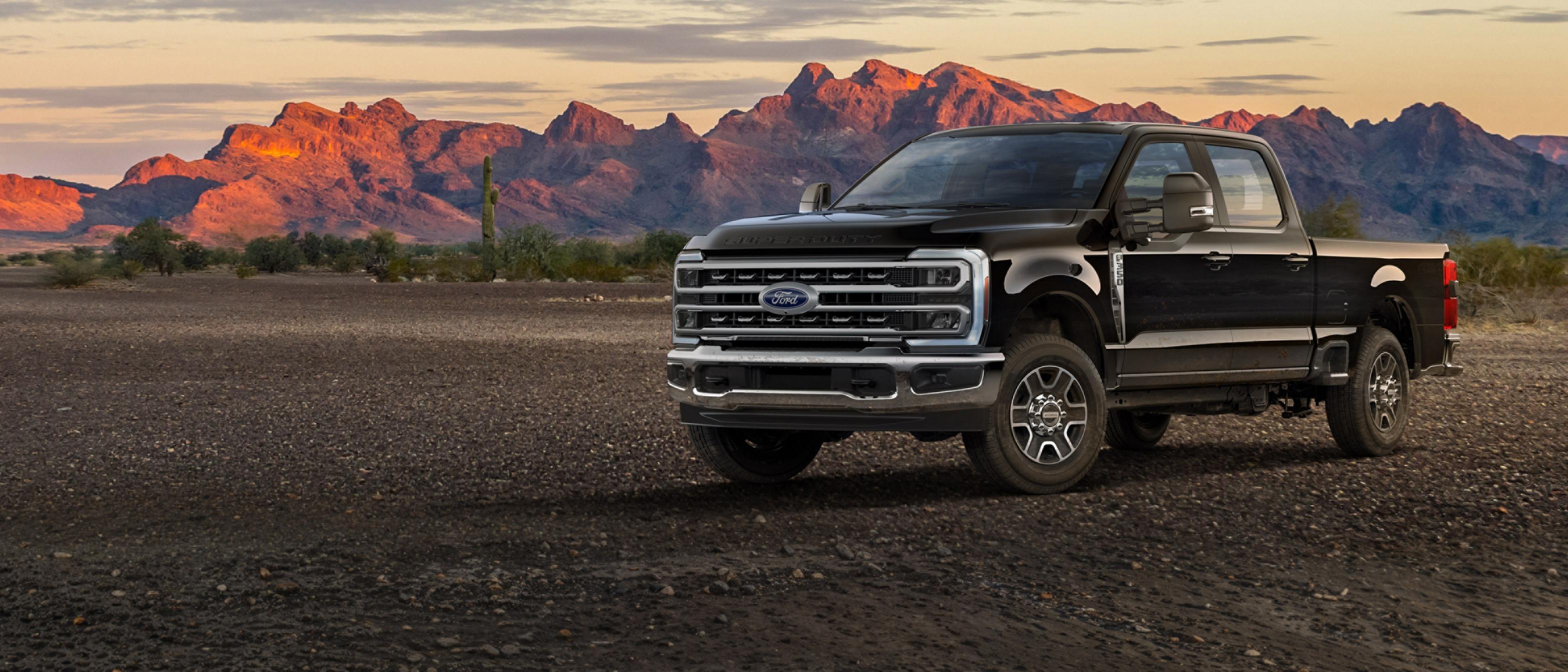 2026 Ford Super Duty® F-350® Lariat® model parked on gravel with mountains in the background