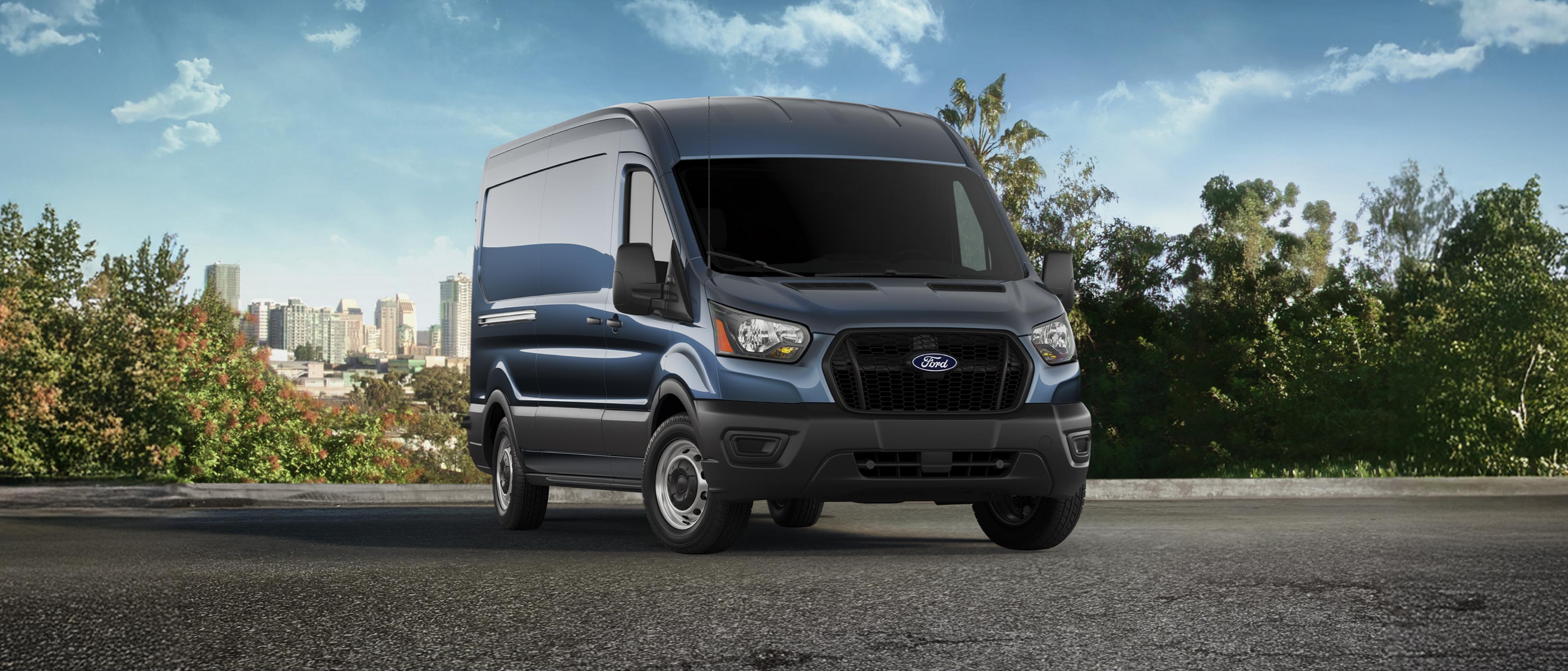 Blue 2026 Ford Transit® van parked overlooking a city horizon