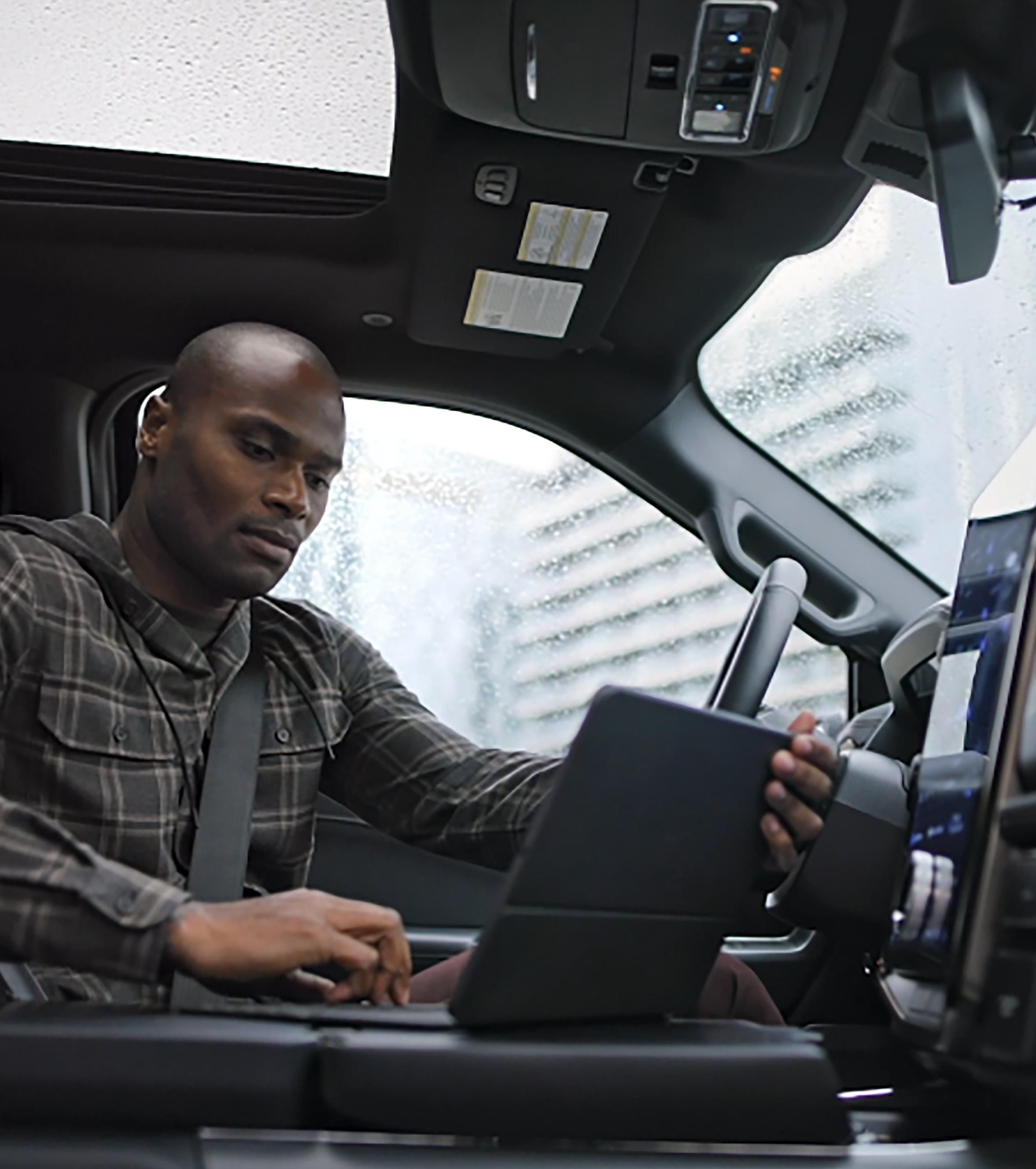 The interior of the 2025 Ford F-150® Lightning® showcases the interior work surface