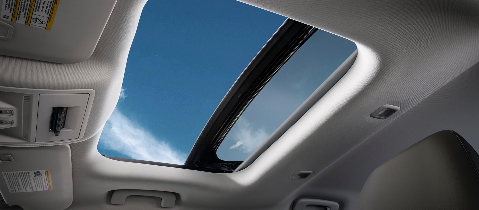  A 2026 Ford Bronco Sport® SUV view out the open sunroof from inside the vehicle