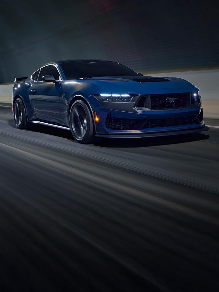 2026 Ford Mustang® Dark Horse® fastback being driven in a tunnel