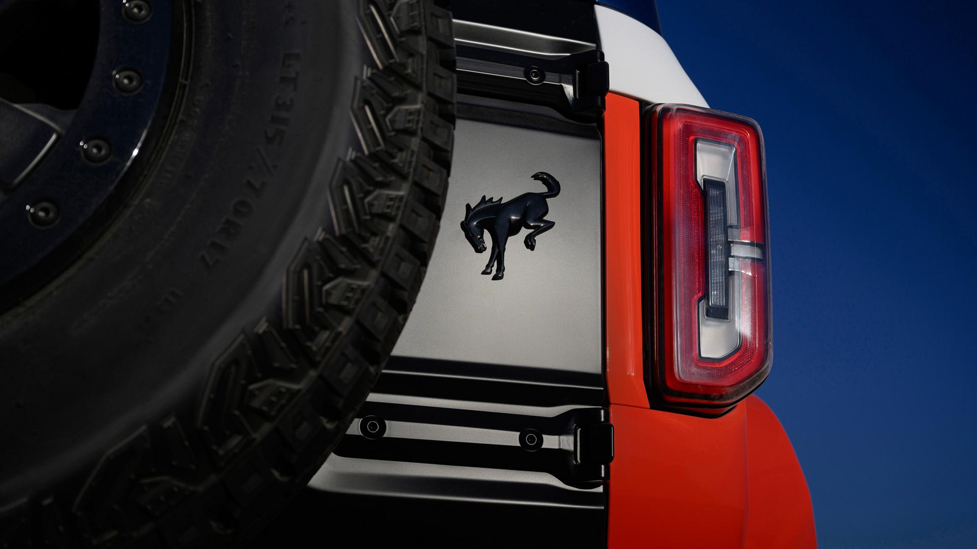 A close-up of the Bronco badge on the rear swing gate of a 2026 Ford Bronco® Stroppe Edition SUV