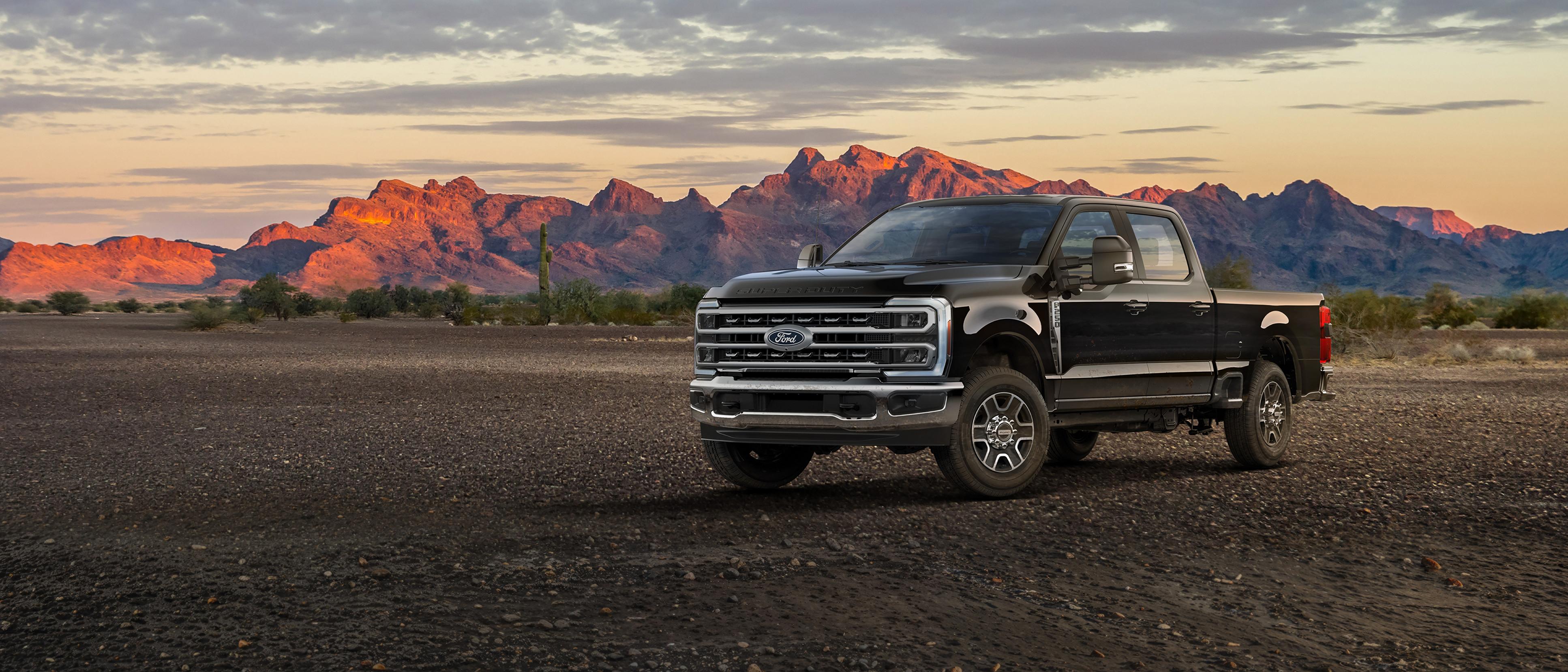 2027 Ford Super Duty® F-250® Lariat® truck parked on a dirt road in the mountains