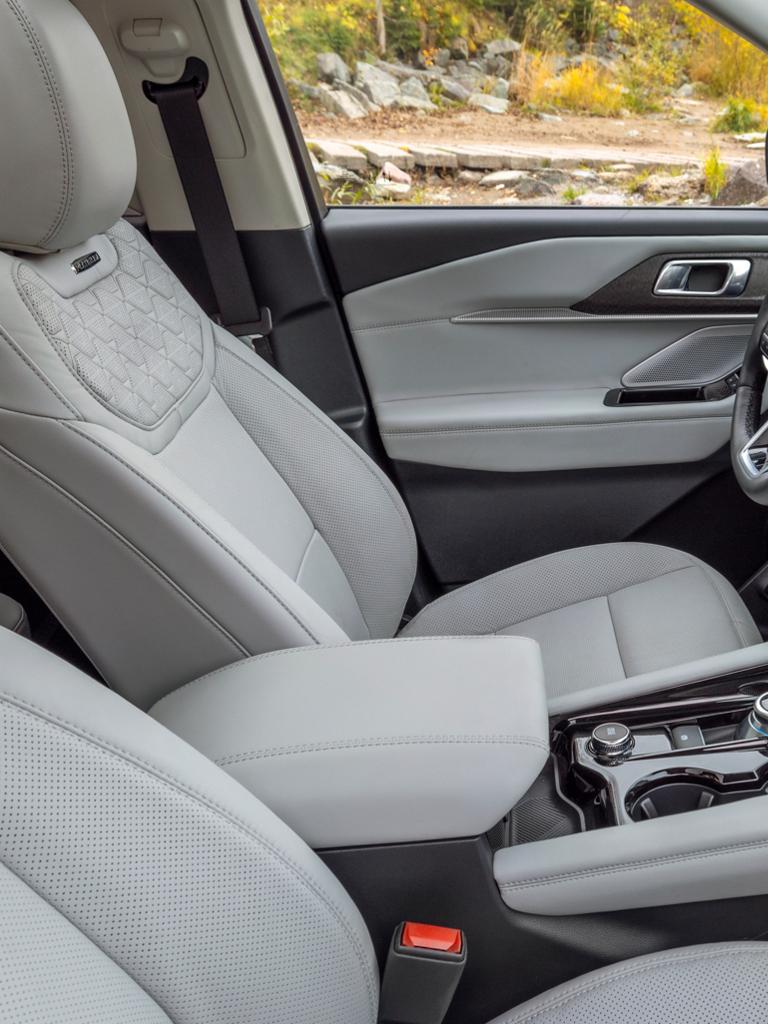 The front seats of a 2026 Ford Explorer® Platinum™ model with available Lux Leather Package