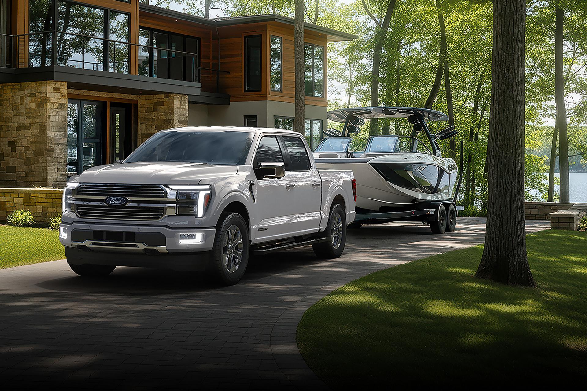 2026 Ford F-150® Platinum model with the Satin Appearance Package being driven on a country road