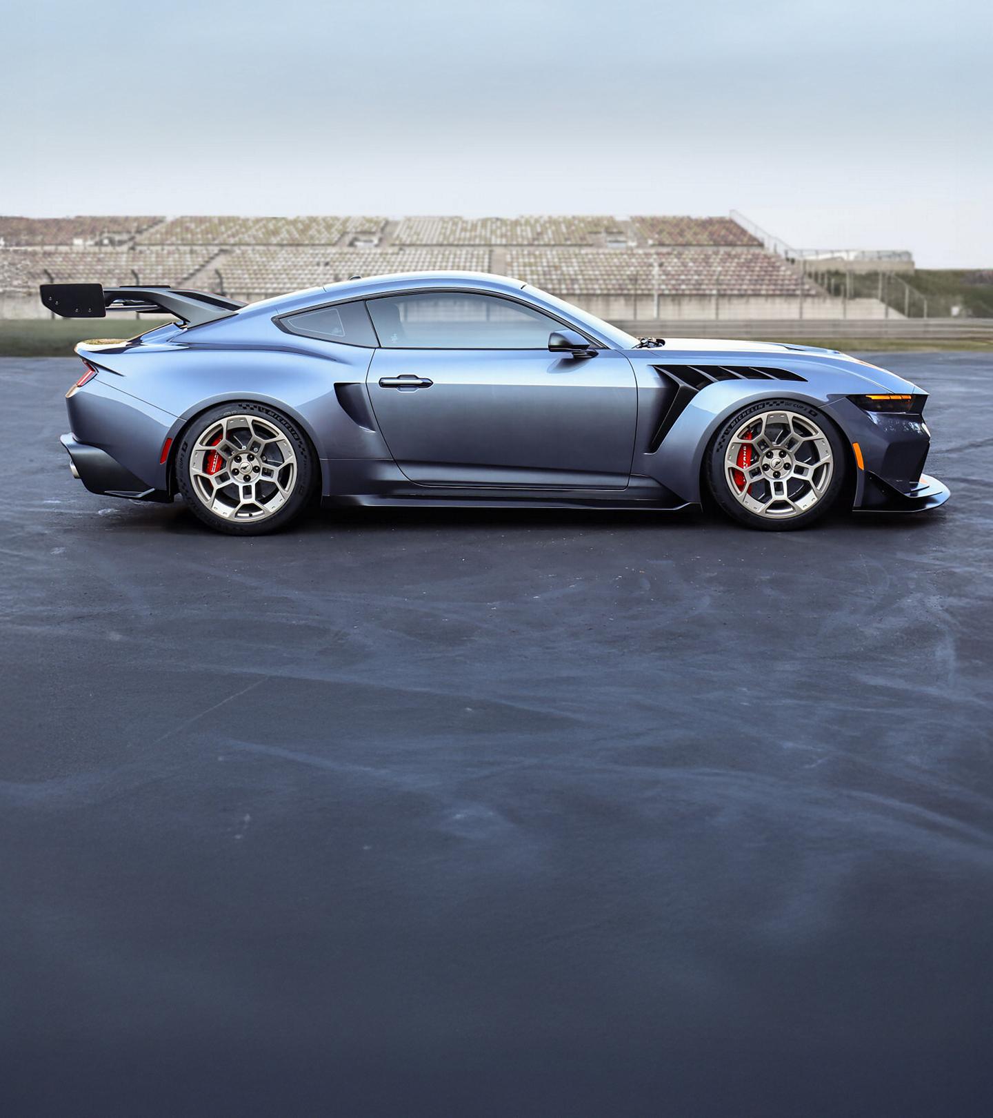 Mustang GTD driving on a desert road.