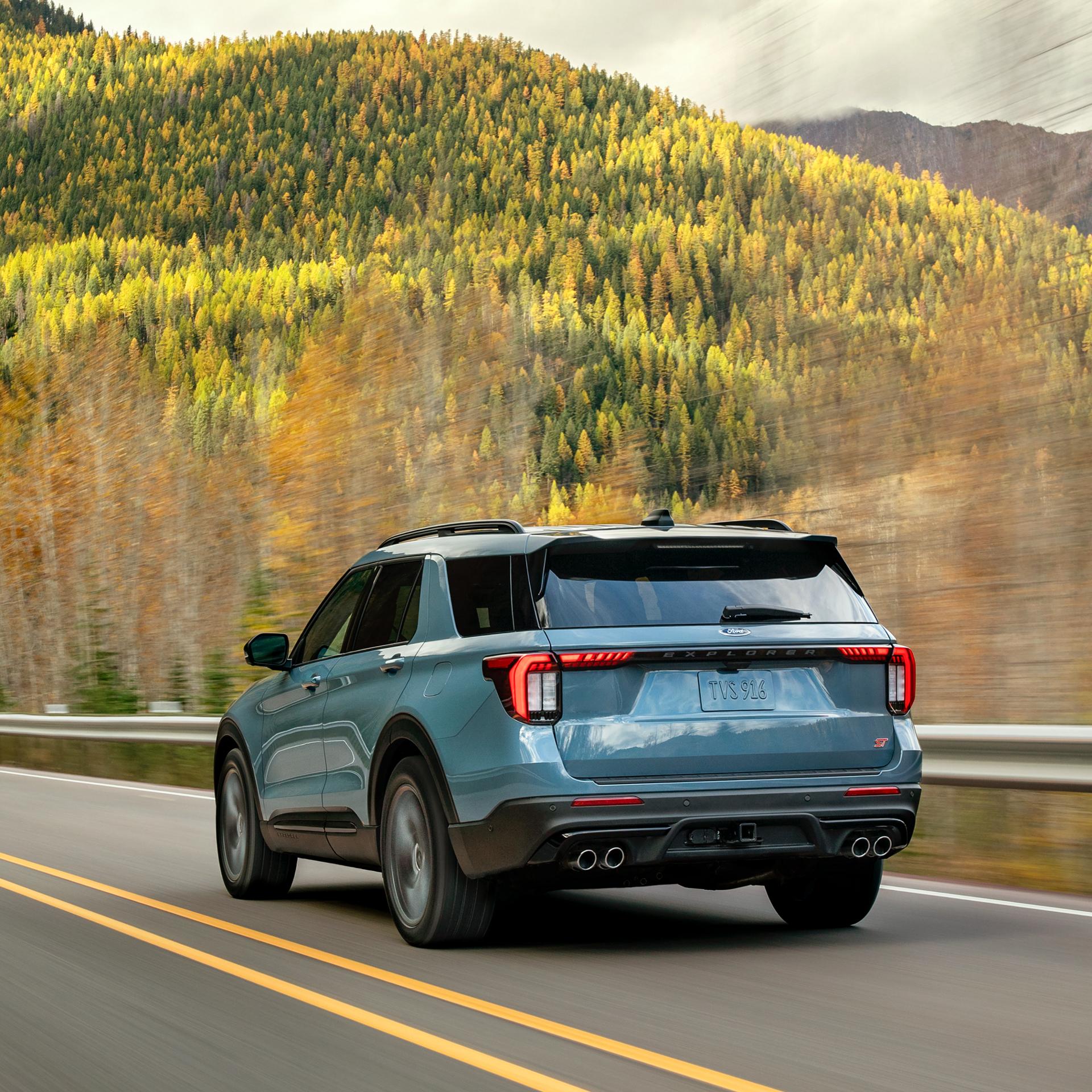 A 2026 Ford Explorer® SUV being driven on a mountain highway