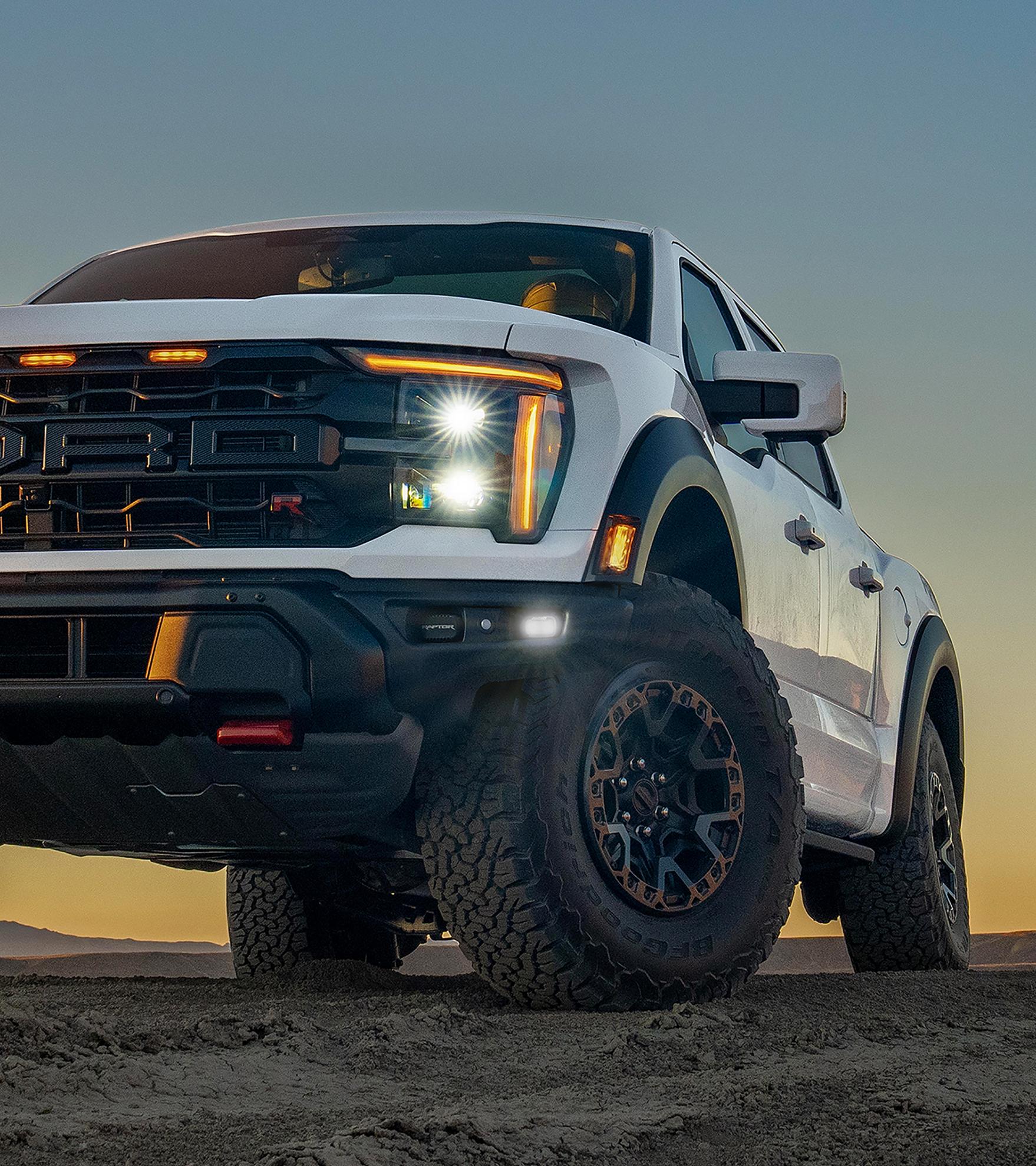 Close-up on the LED headlamp and fog lamp on a 2025 Ford F-150® Raptor® R™ pickup