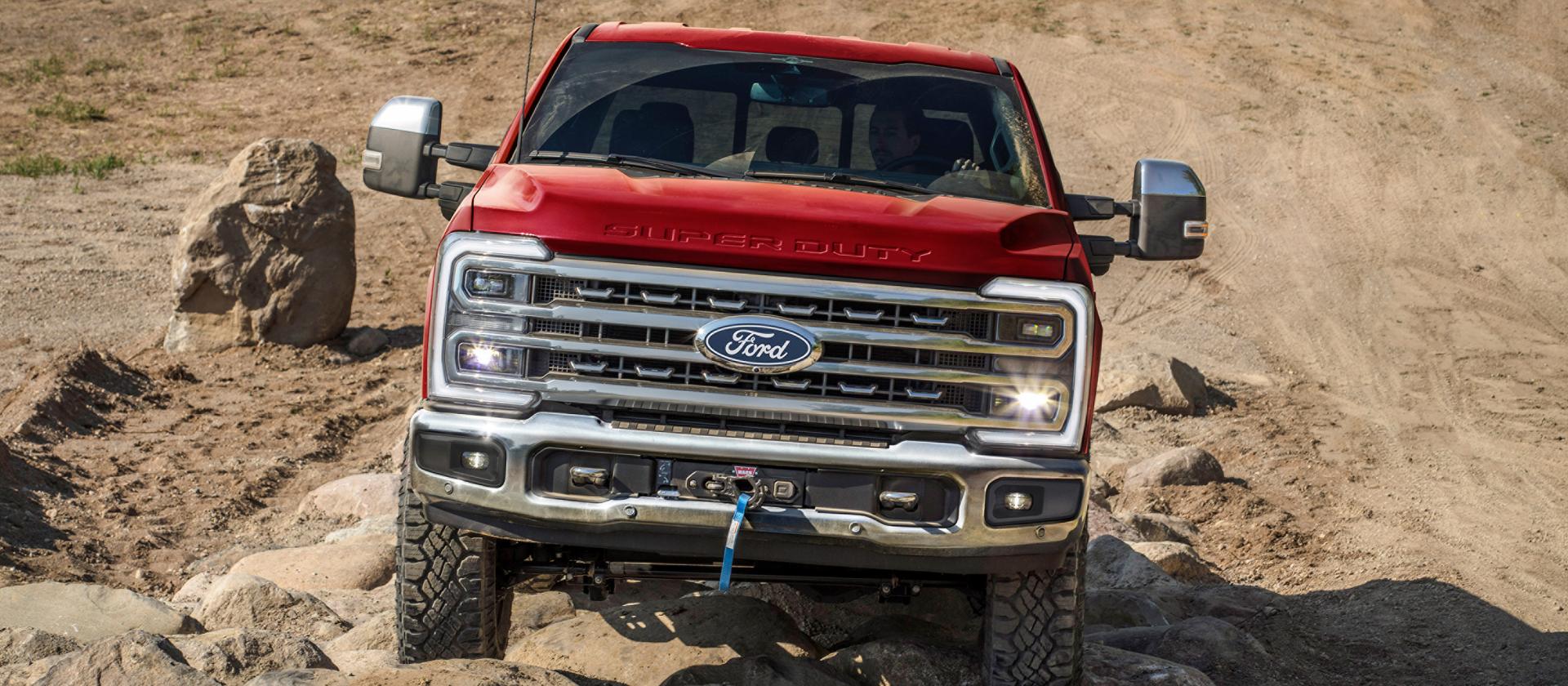 2027 Ford Super Duty® F-250 pickup with the Tremor® Off-Road Package being driven on rocky terrain