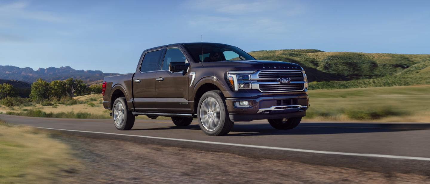 F-150 driving on a two-lane highway.