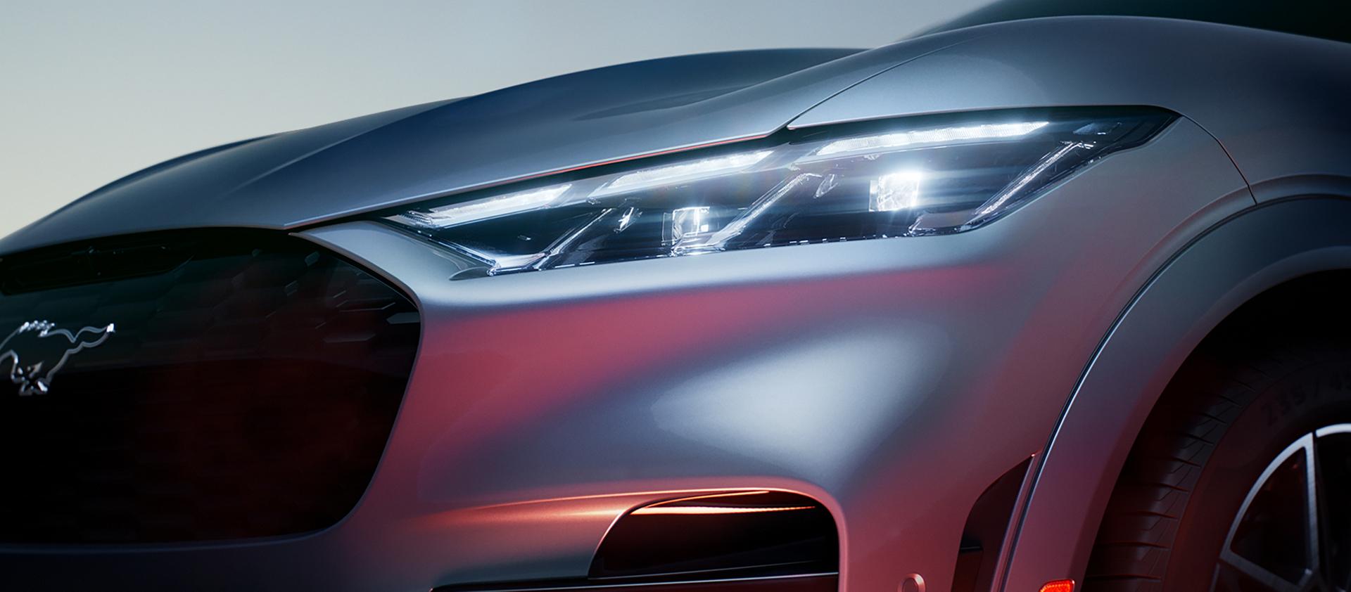 Close-up of the light glinting off the front left quadrant of the 2026 Ford Mustang Mach-E® SUV