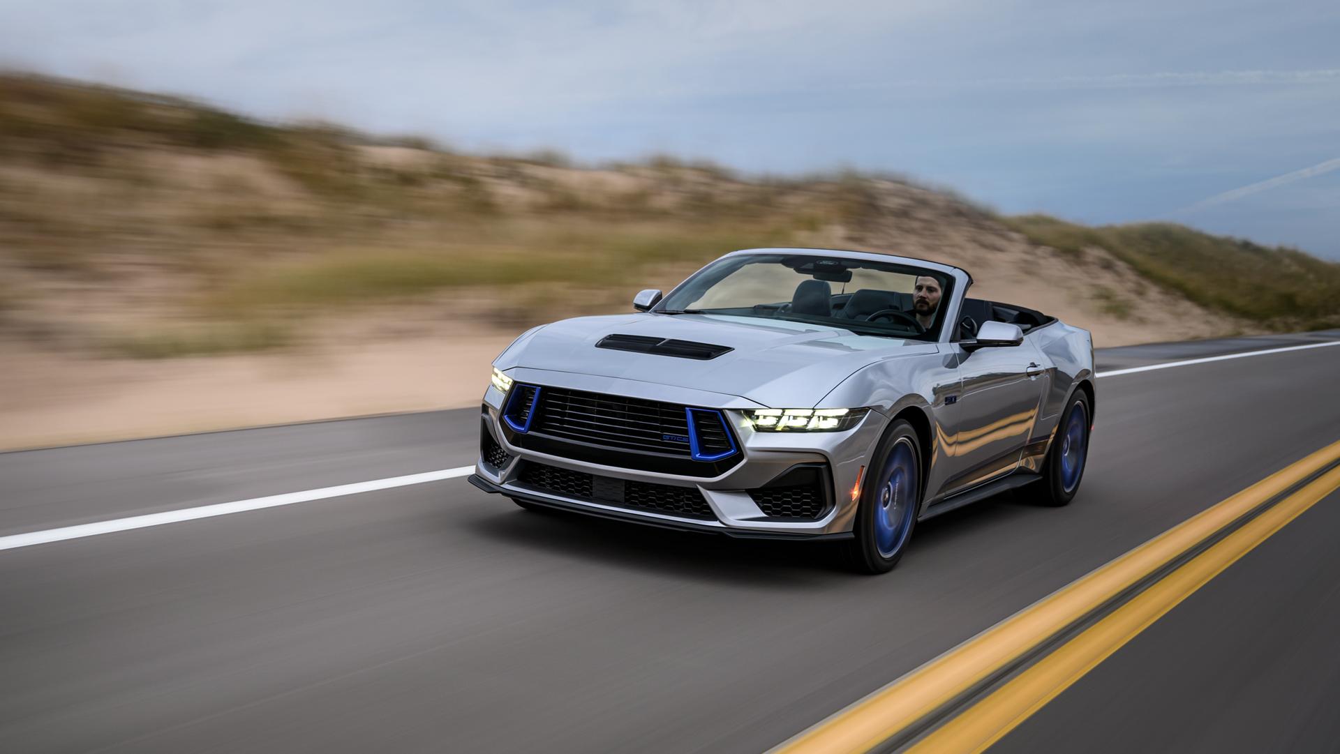 2025 Ford Mustang® GT Convertible with California Special® Package being driven on a coastal highway