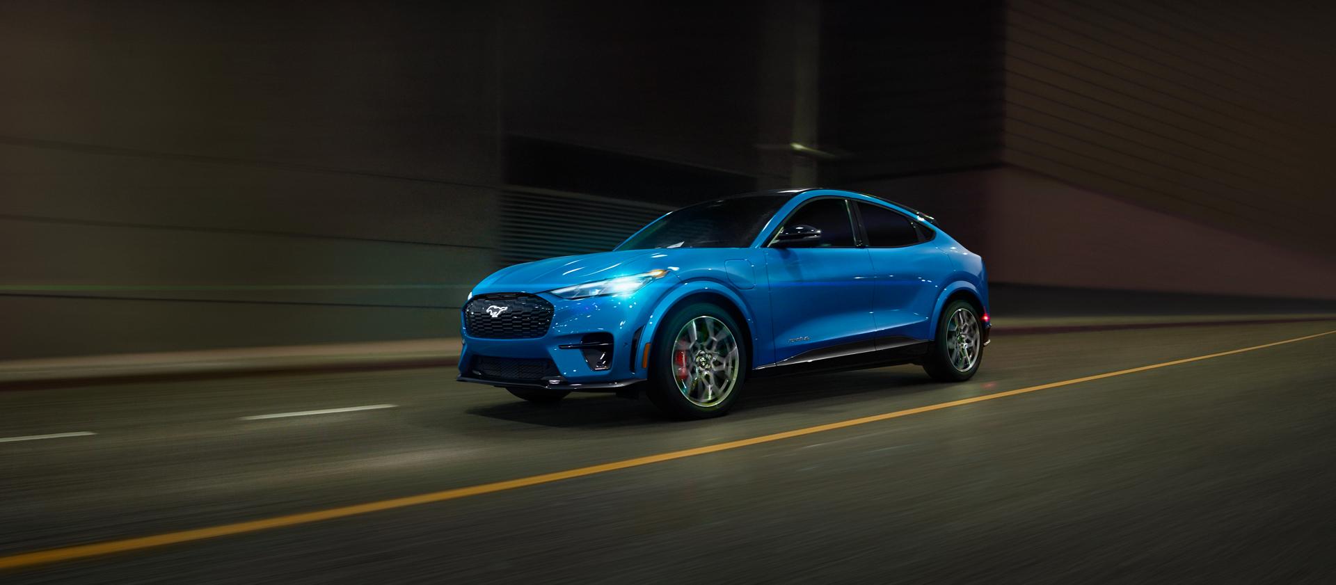 2025 Ford Mustang Mach-E® being driven through a tunnel with a blurred background