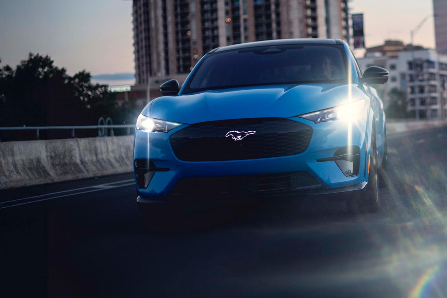 Mustang Mach-E driving on a highway.