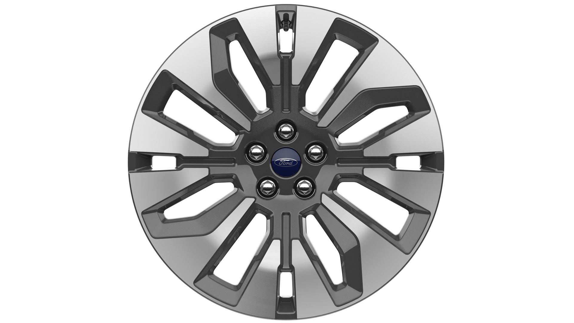A 21-inch Bright Machined wheel with Dark Tarnish-painted pockets on a white background