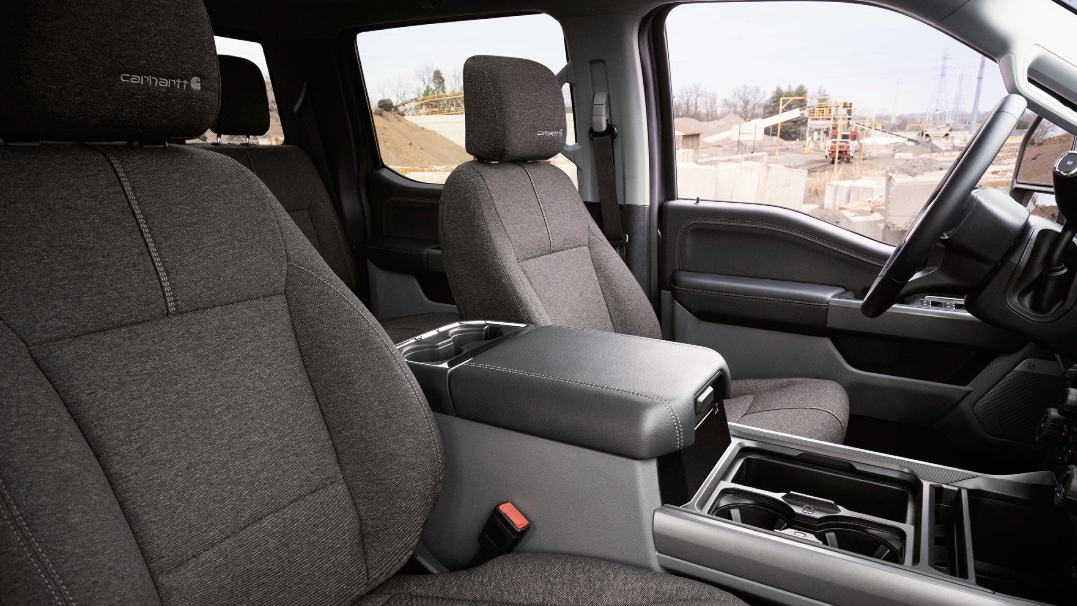 Front seats view inside the 2027 Ford Super Duty® F-350® XLT with the Super Duty Carhartt® Package