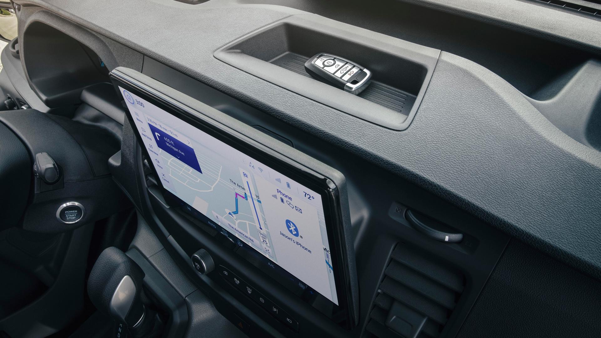 Close-up of the upper dashboard storage compartments in the 2025 Ford Transit® Van