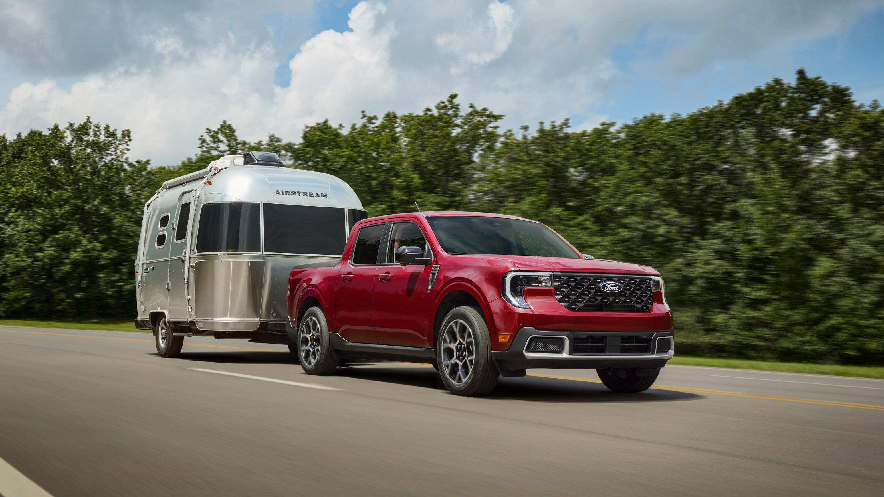 2026 Ford Maverick® pickup towing an Airstream camper trailer