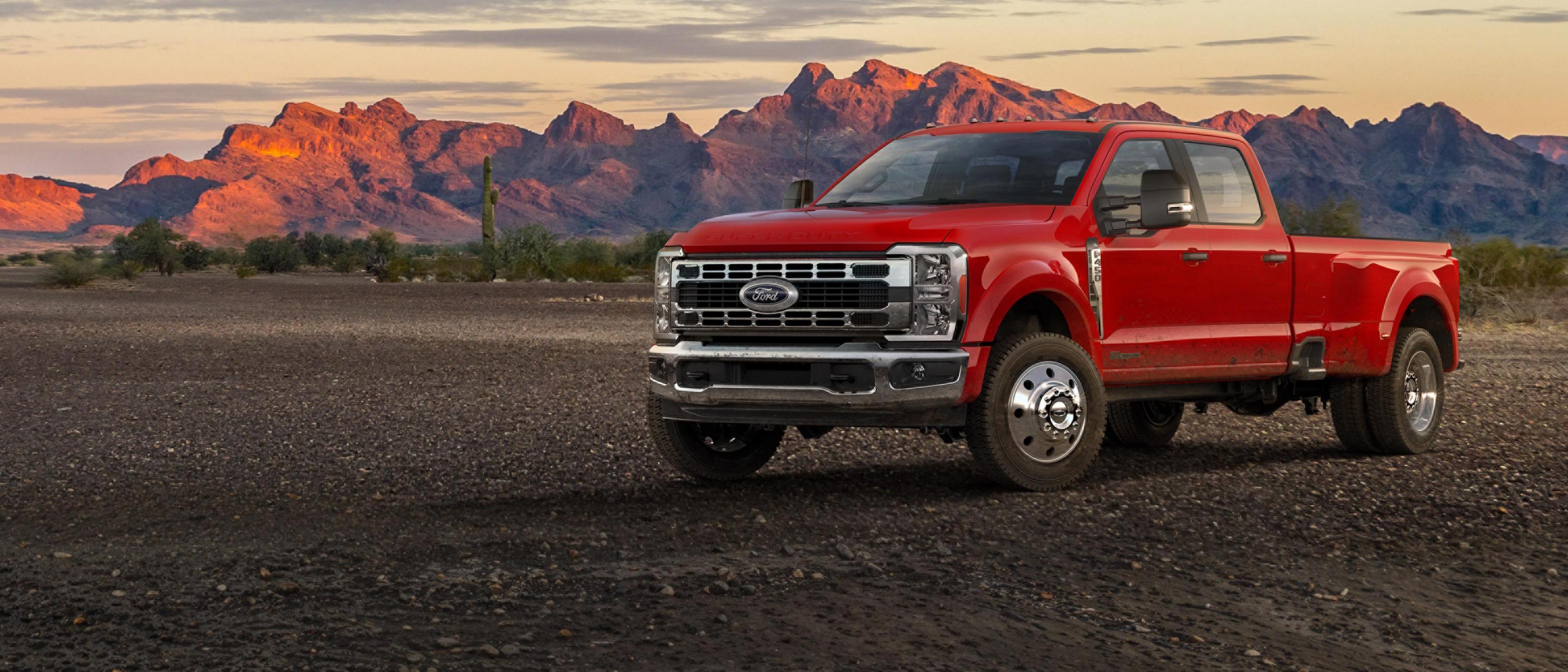2026 Ford Super Duty® F-450® XLT truck parked on a dirt road in the mountains