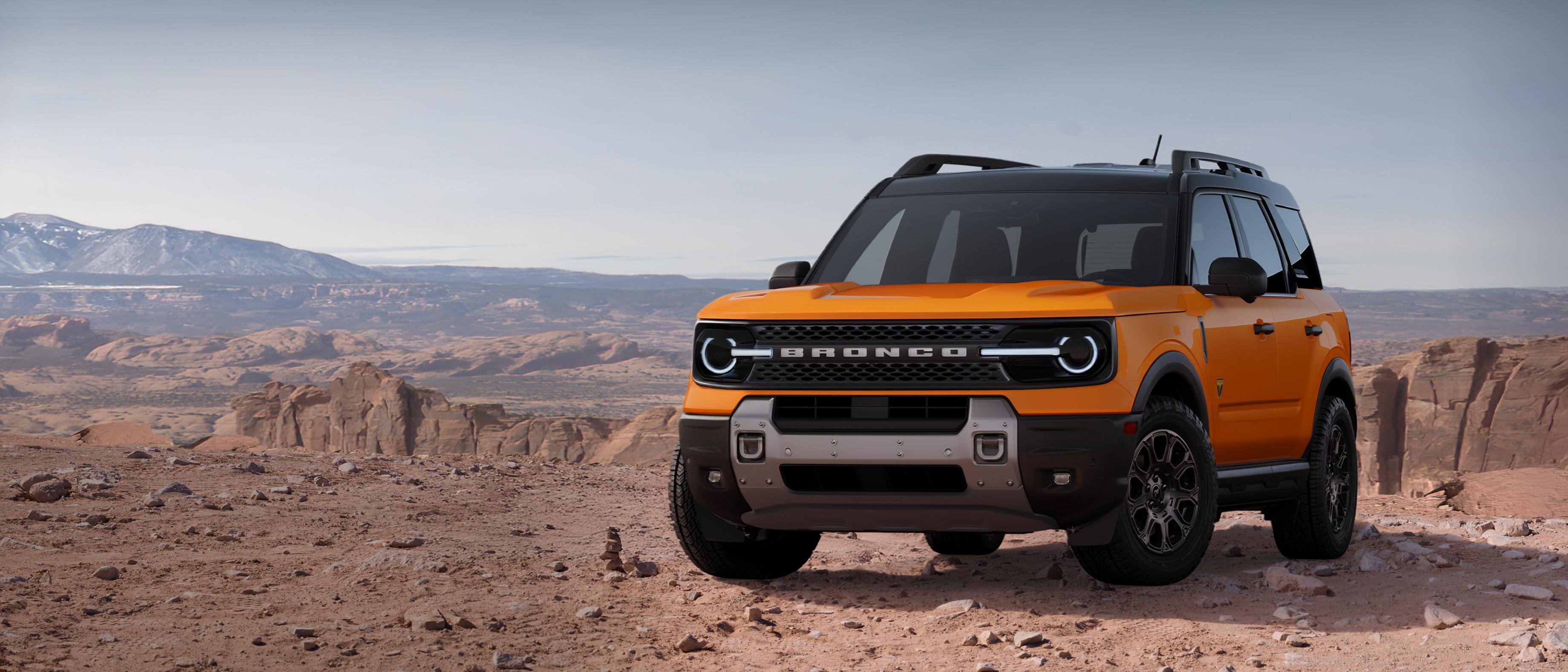 2026 Ford Bronco Sport® Badlands® SUV parked on dirt with rocky cliffs in background
