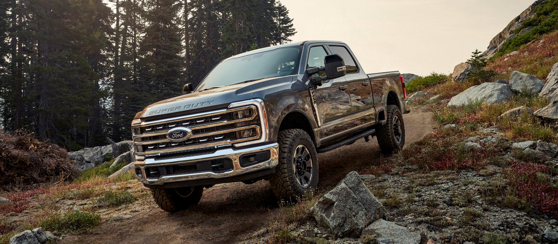 2026 Ford Super Duty® F-250® with the Tremor® Off-Road Package parked on a rocky mountain side