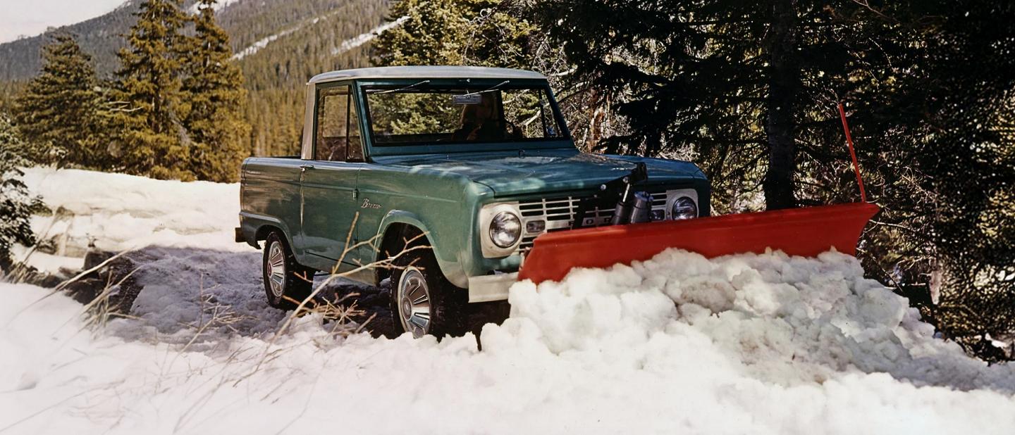 1960s Bronco Sport Utility with snowplough attachment.