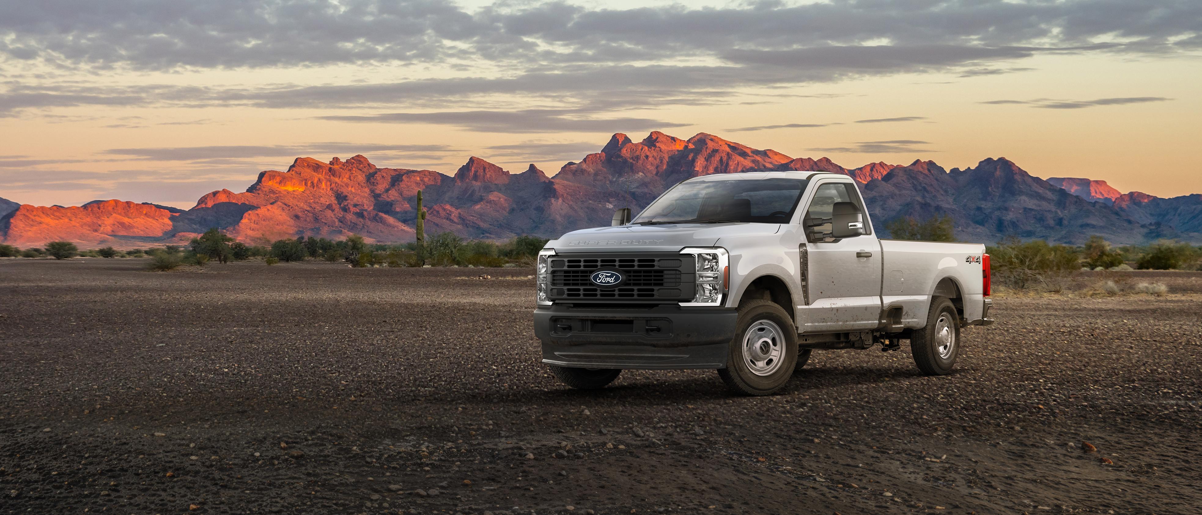 2027 Ford Super Duty® F-250® XL truck parked on a dirt road in the mountains