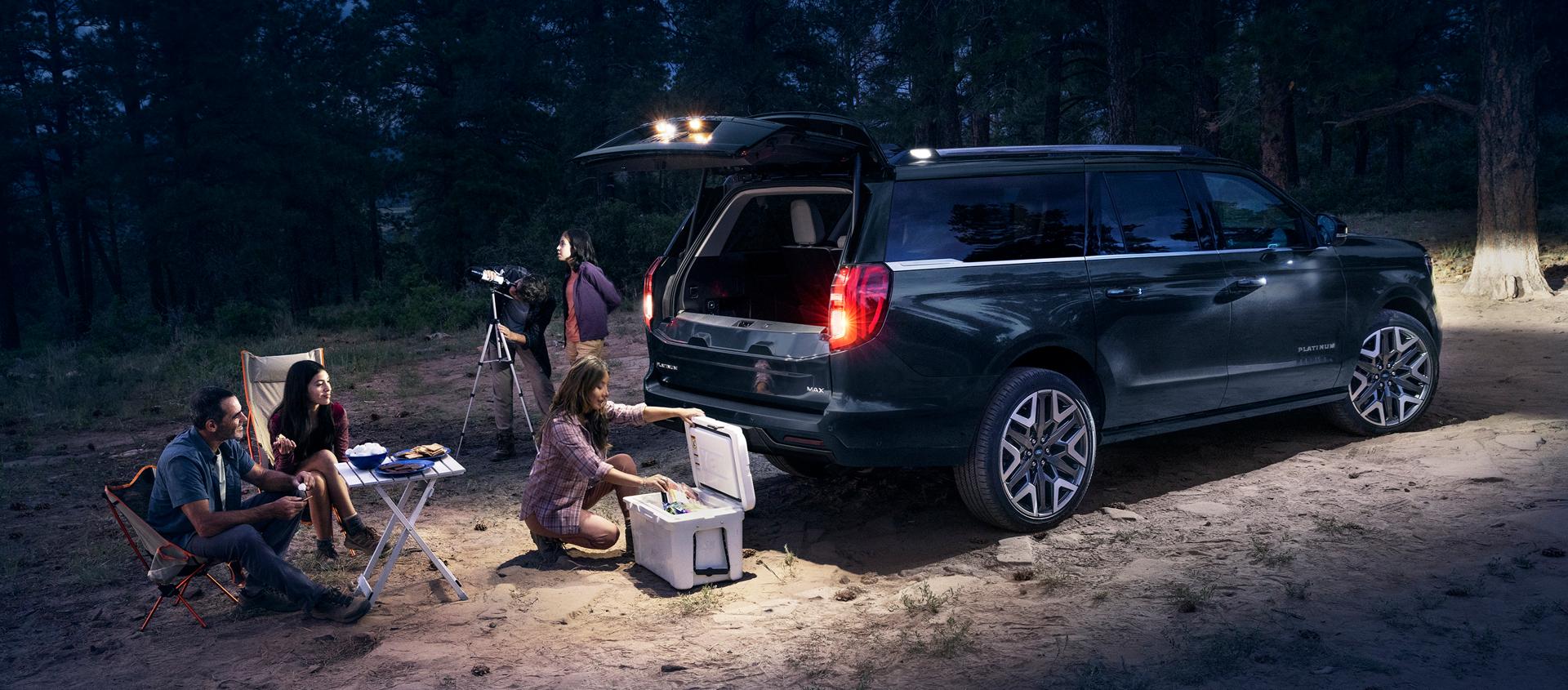 2027 Ford Expedition® MAX Platinum™ SUV with available 360-degree Zone Lighting with people nearby