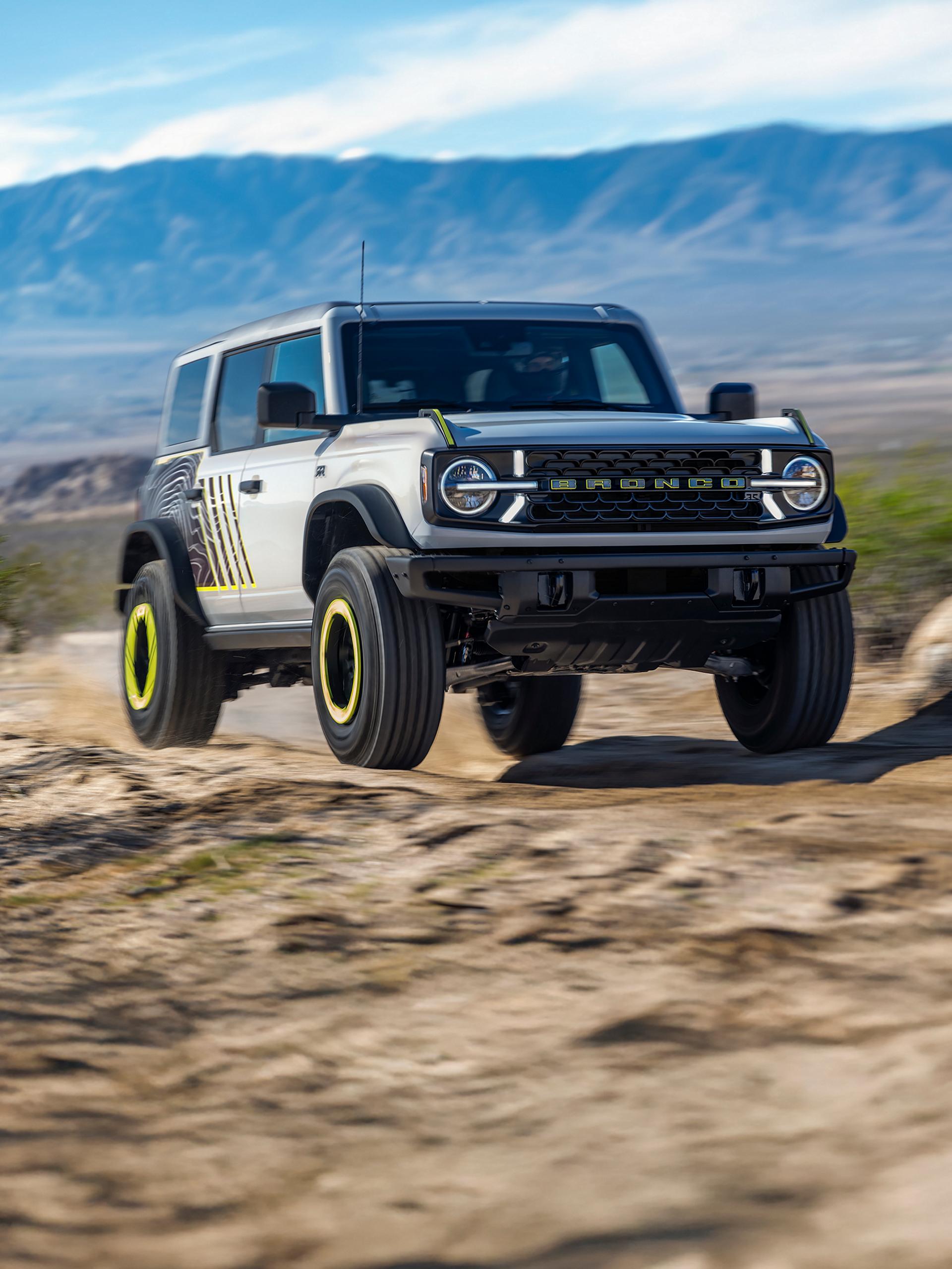 A 2027 Ford Bronco® RTR model parked on a scrubby desert landscape