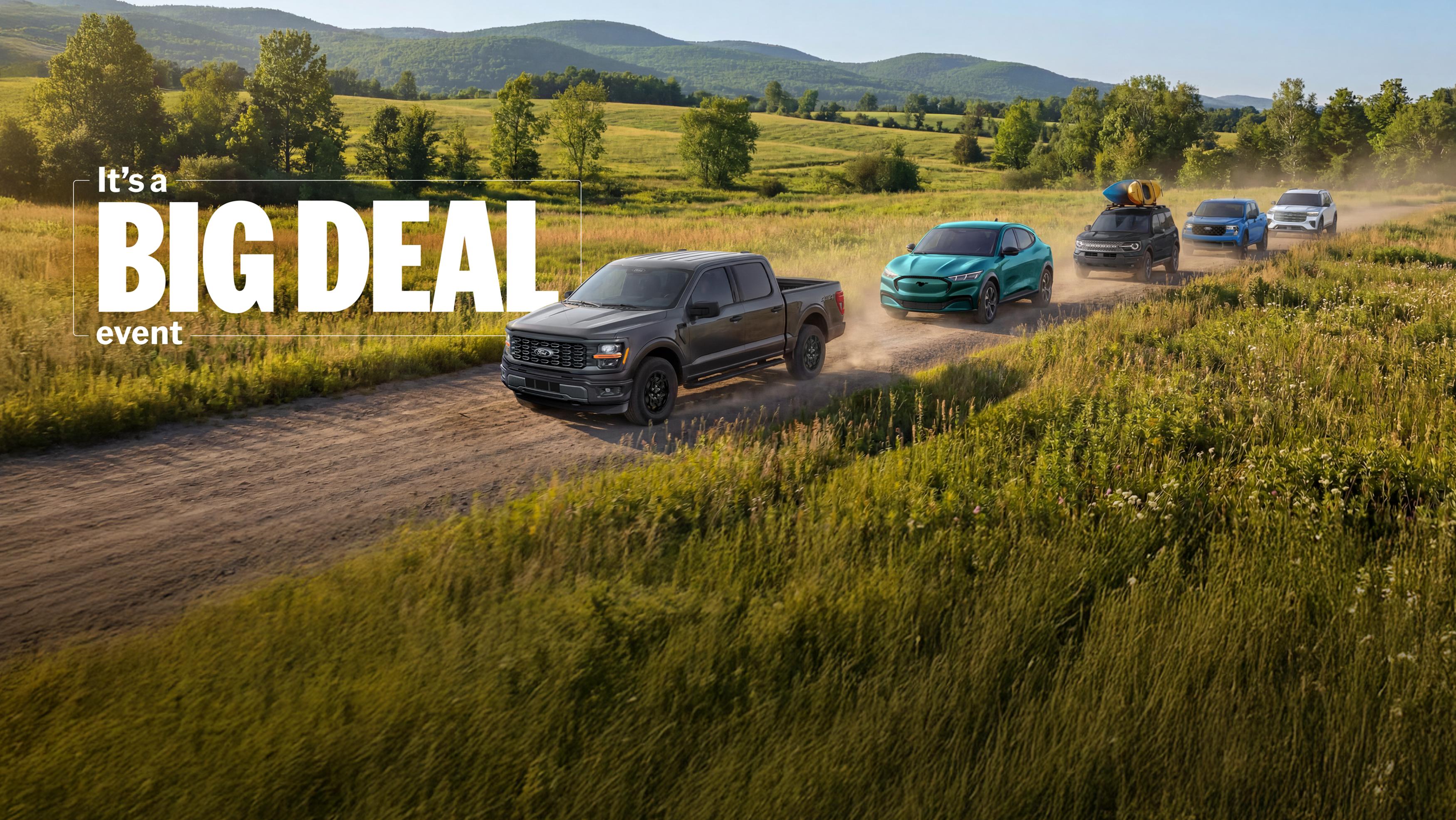 It's a big deal event. The lineup of Ford vehicles is shown from left to right: F-150, Mach-E, Bronco Sport, Maverick, and Explorer.