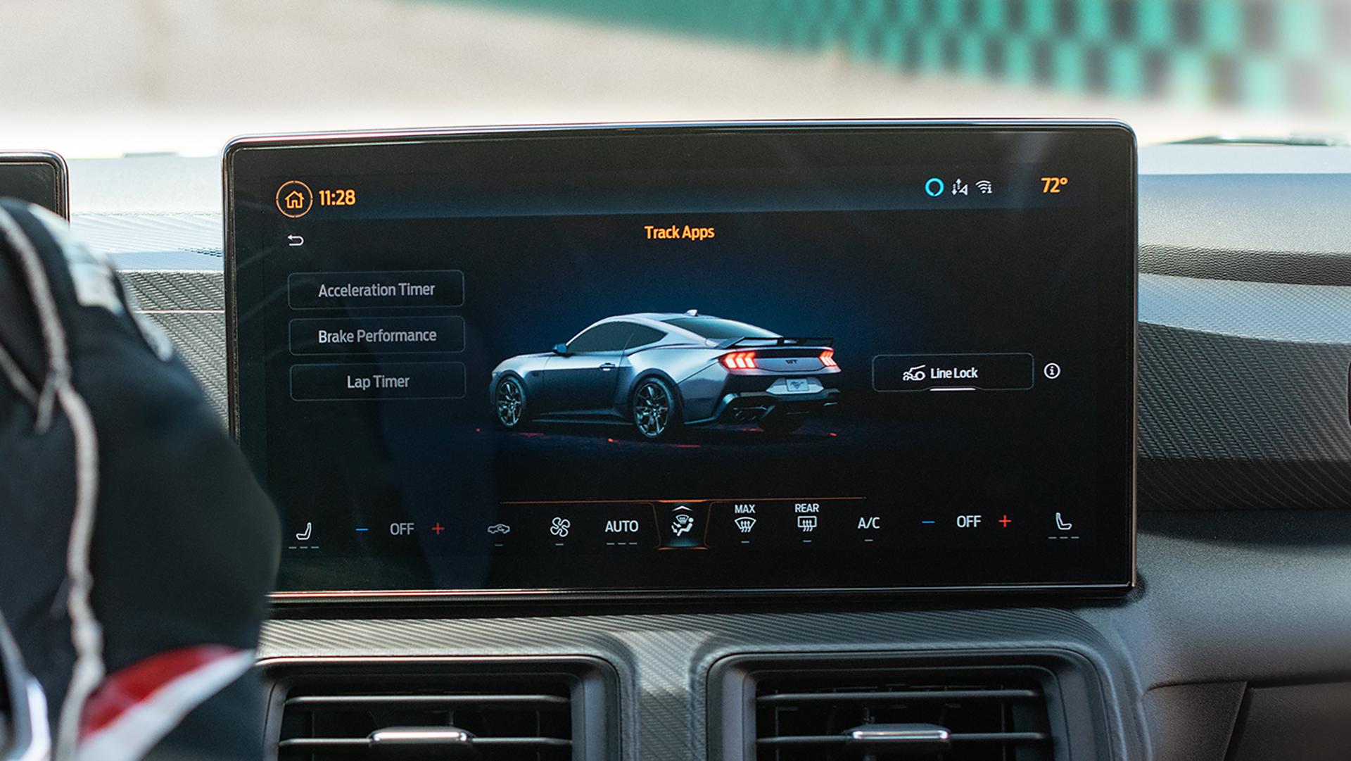 Person driving a 2026 Ford Mustang® model with Track Apps® on a closed course