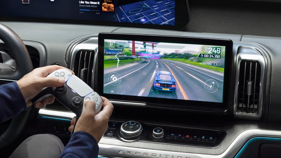 Parked 2027 Ford Expedition® SUV 13.2-inch centre display with driver playing a video game