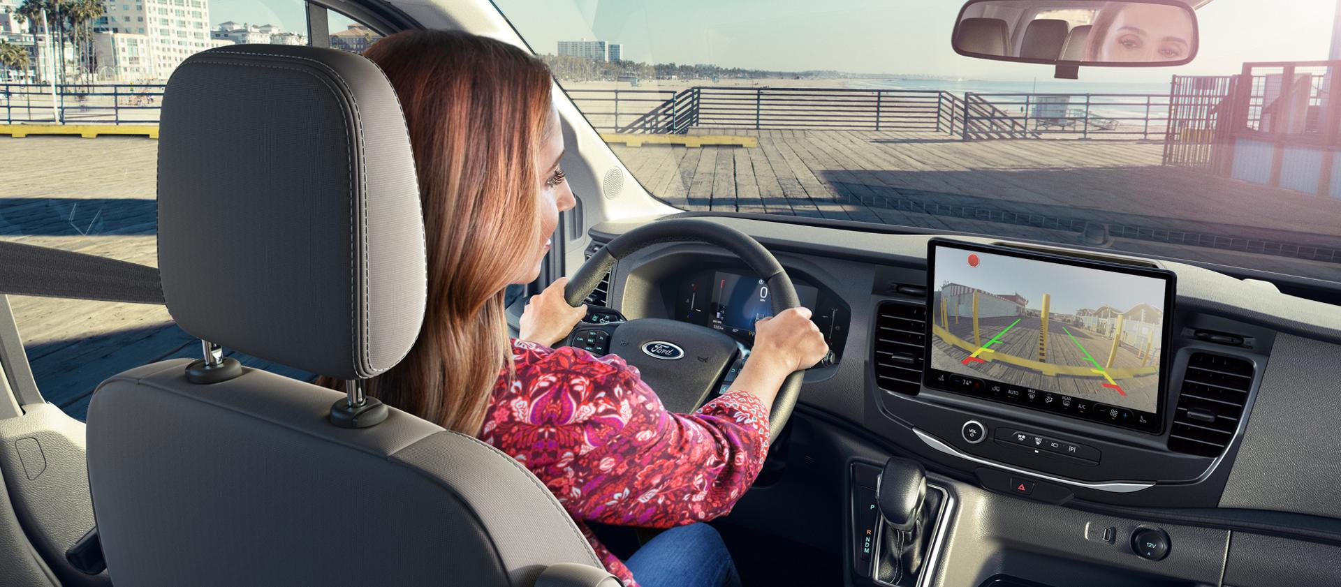 A driver using the 2026 Ford Transit® van rearview camera