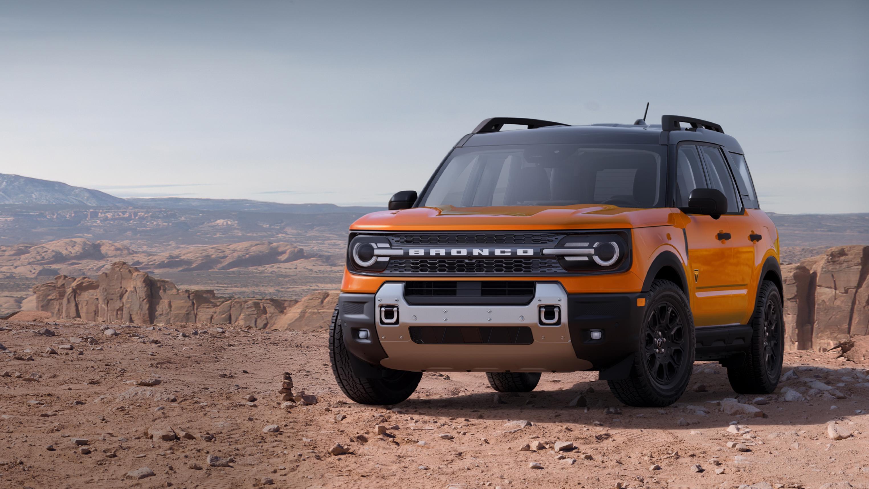 2026 Ford Bronco Sport® Badlands® SUV parked on dirt with rocky cliffs in background