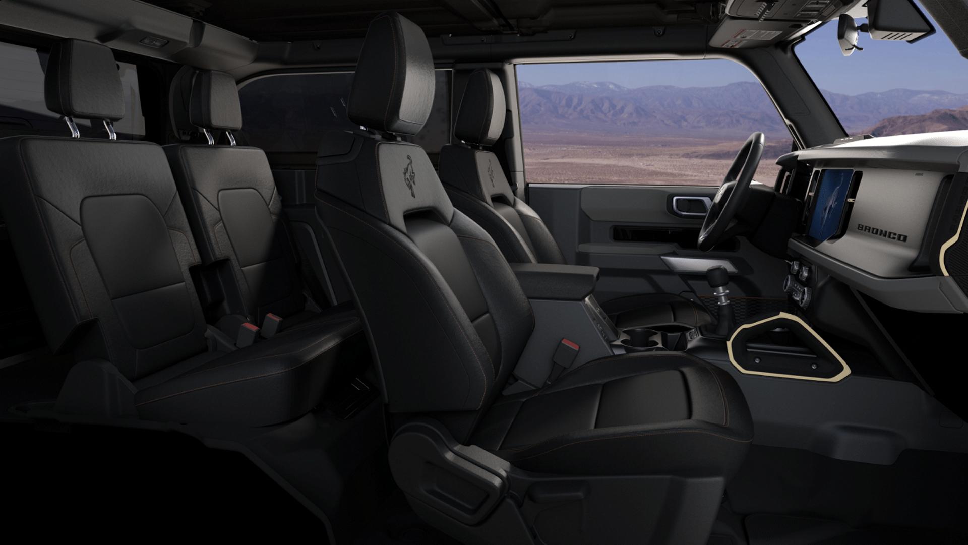 The front seat area of a 2025 Ford Bronco® SUV, showing the marine-grade vinyl seat coverings