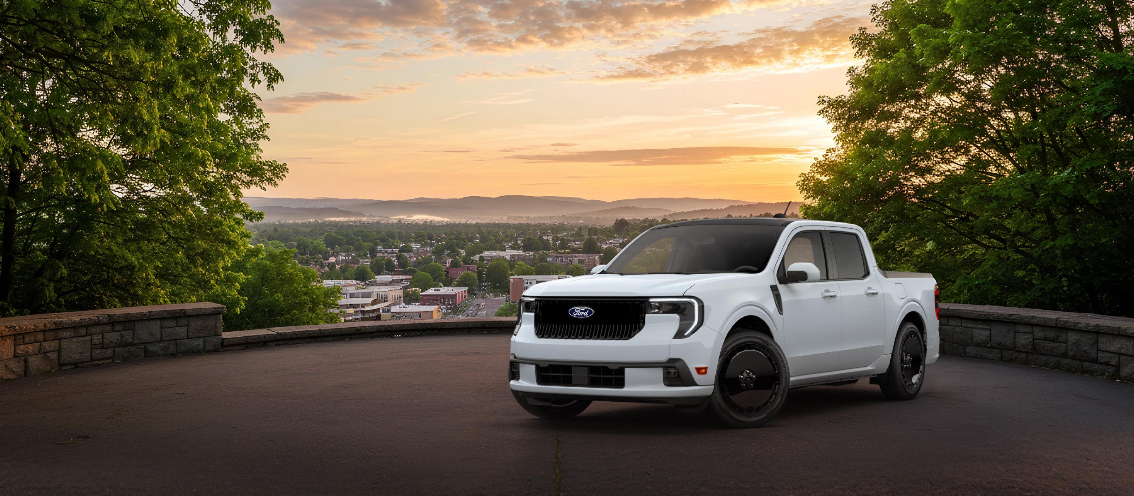 2026 Ford Maverick Lobo™ model in Space White parked overlooking a city