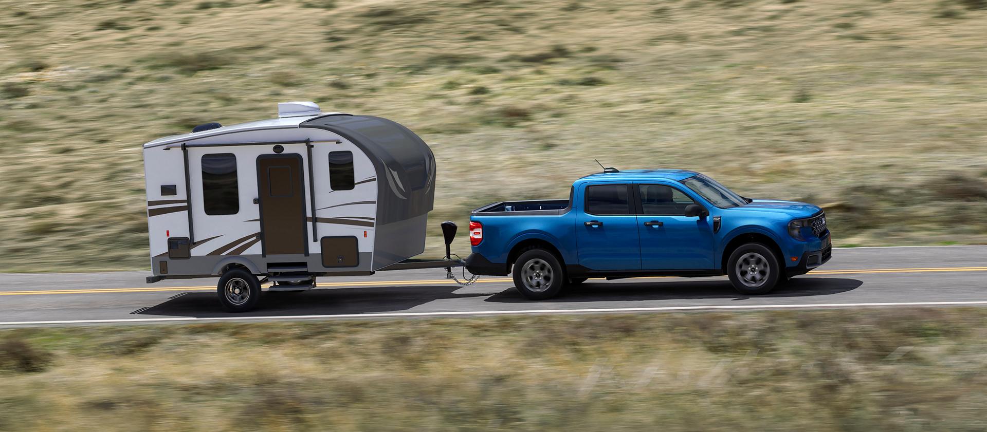 2026 Ford Maverick® XLT pickup pulling a trailer