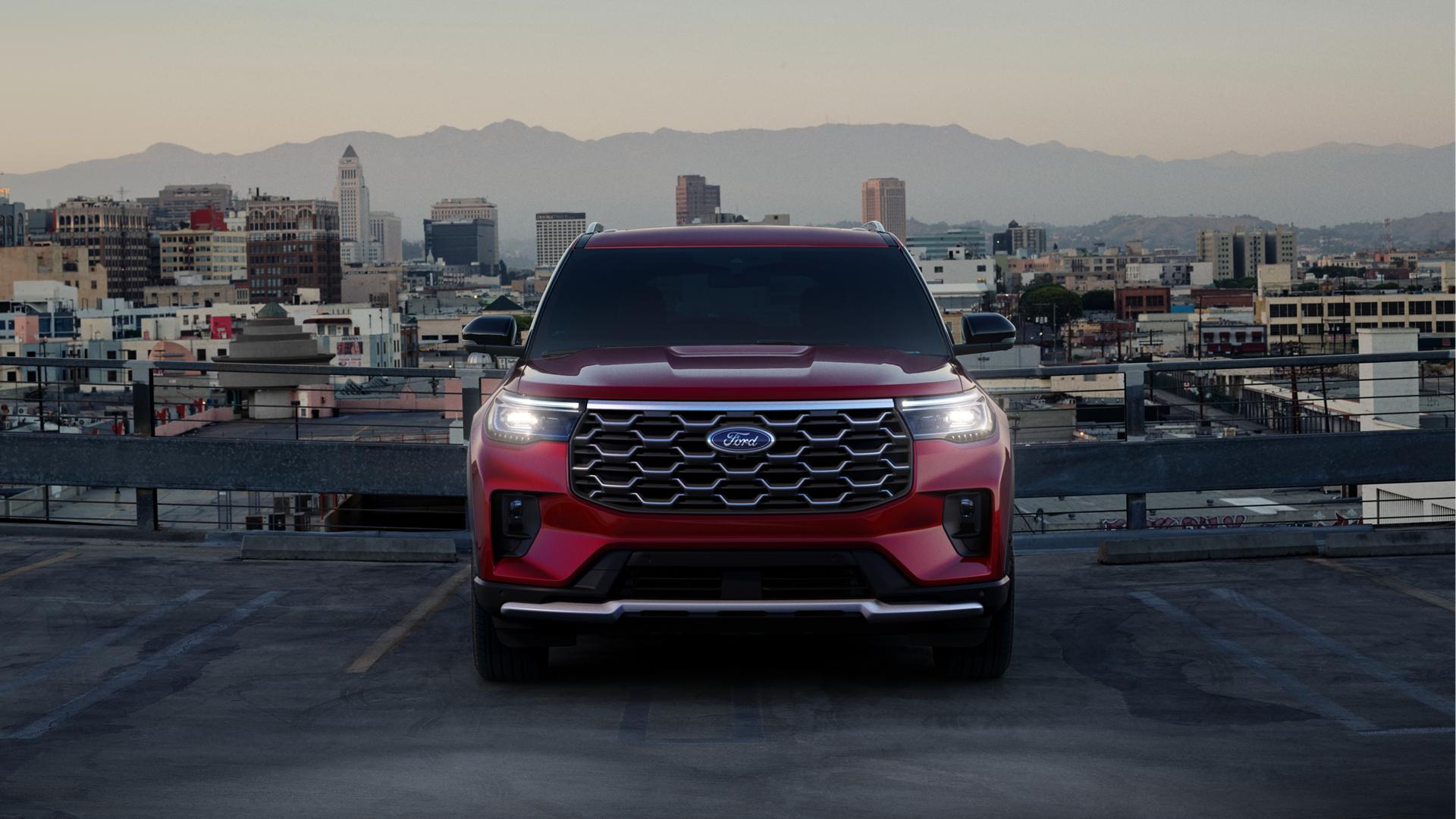 The front of a 2026 Ford Explorer® SUV with the headlamps illuminated