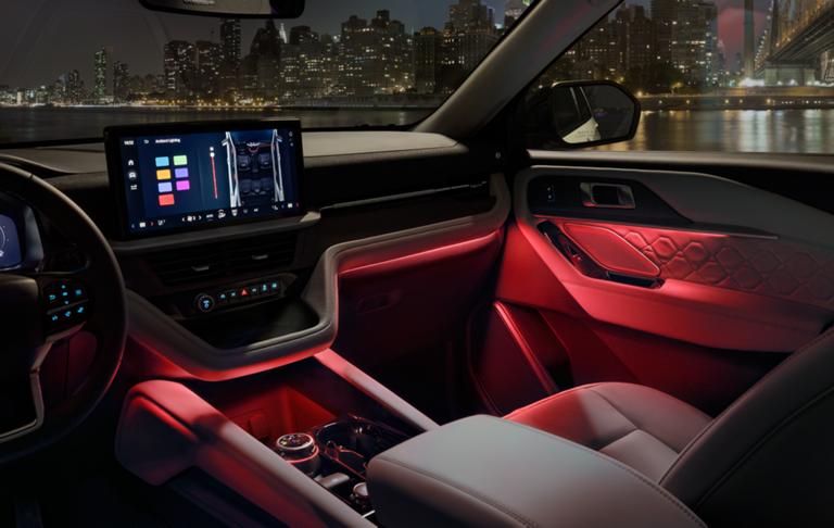The interior of a 2026 Ford Explorer® SUV showing Ambient Lighting