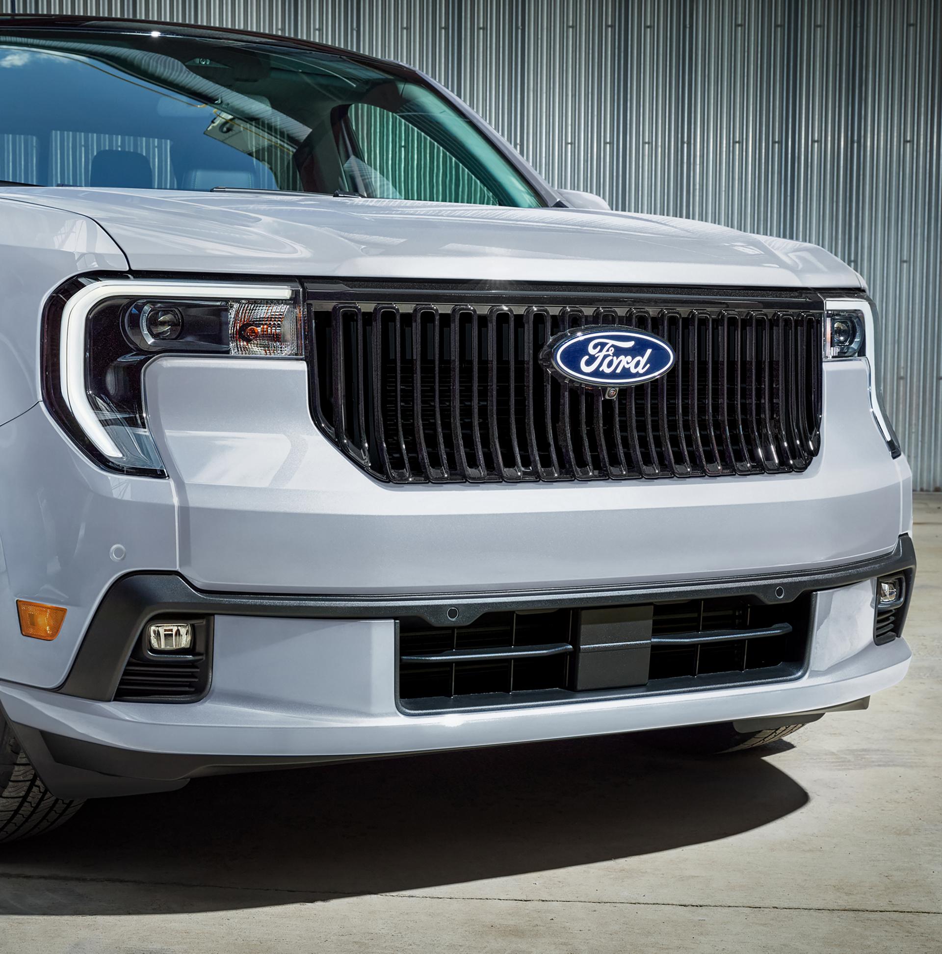 Close-up of the front grille of a parked 2026 Ford Maverick® Lobo™ model