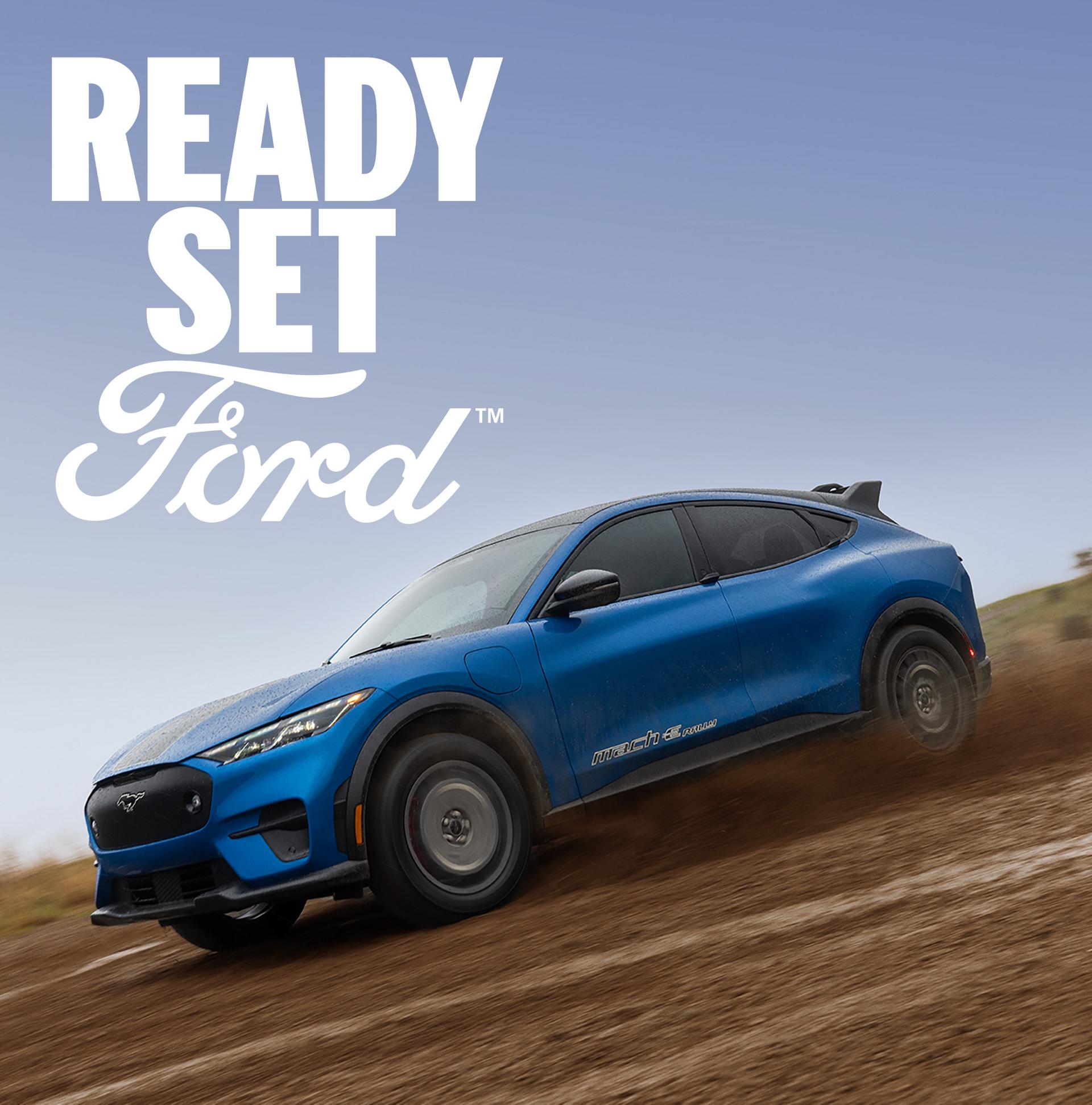 Angled view of a 2026 Ford Mustang Mach-E® GT model with the words Ready, Set, Ford™