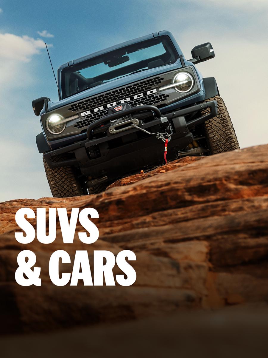 Ford SUVs driving through outdoor trails. "SUVs and Cars"