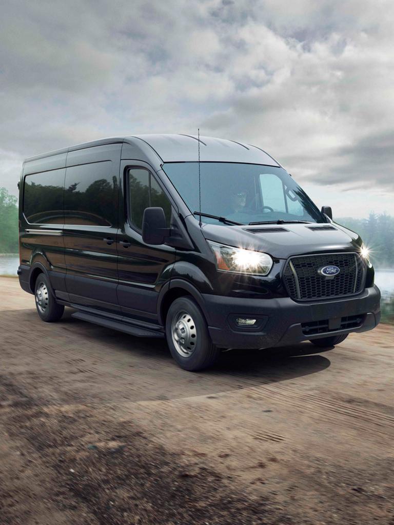 2026 Ford Transit® van being driven on a rural road
