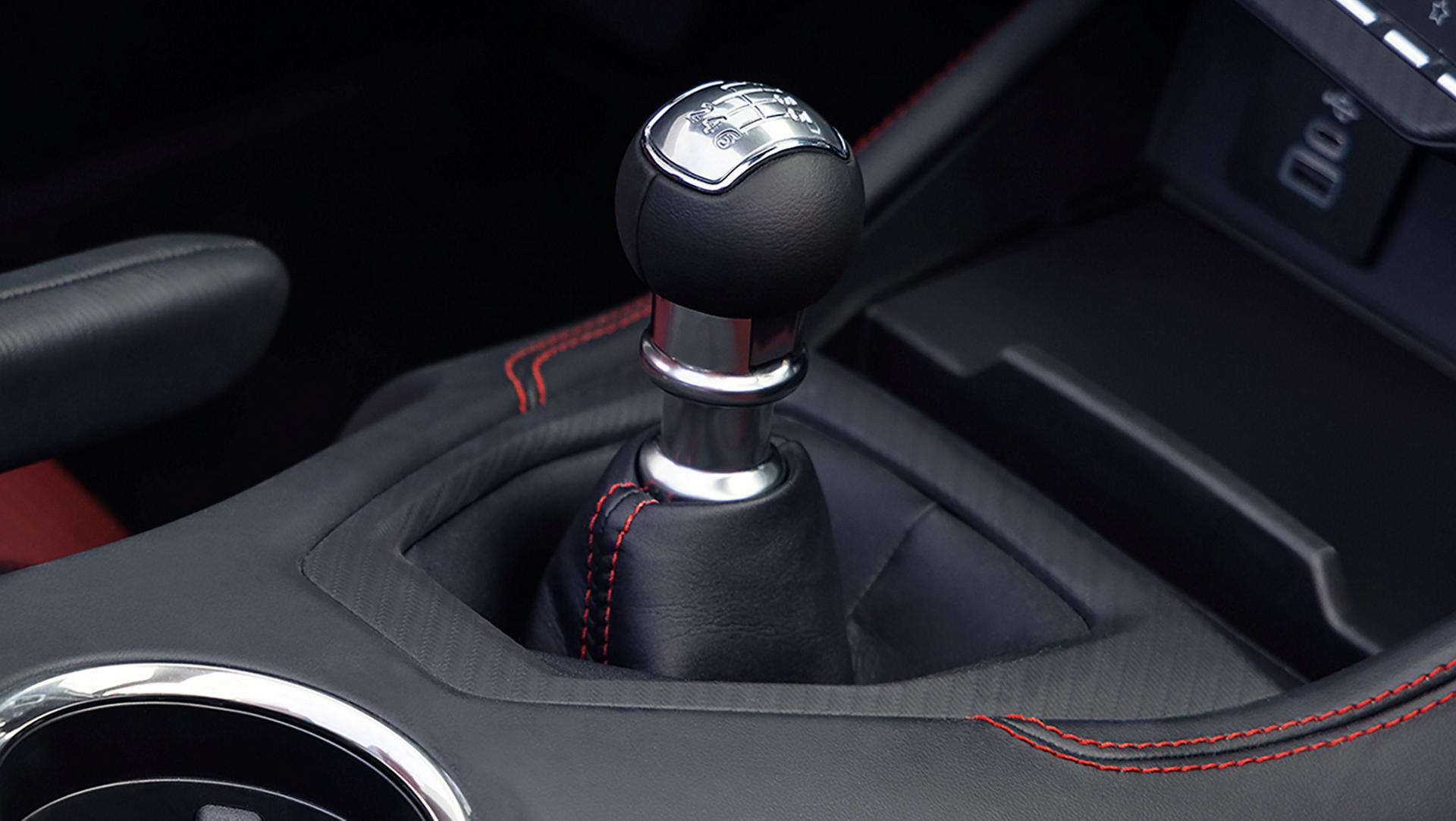 2026 Ford Mustang® GT 6-speed manual transmission shifter with available Carmine Red interior