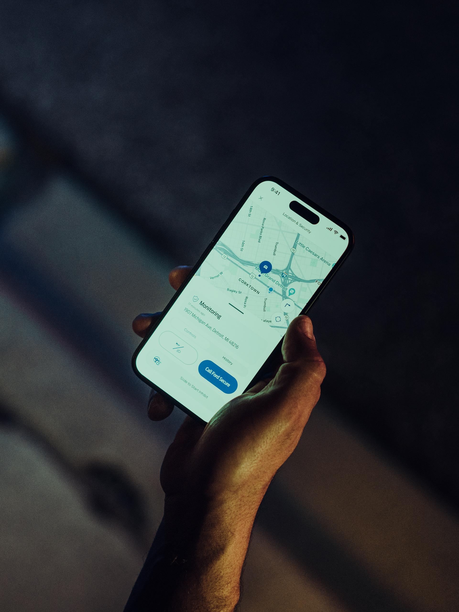 Person getting Ford Security Package alerts on a mobile phone