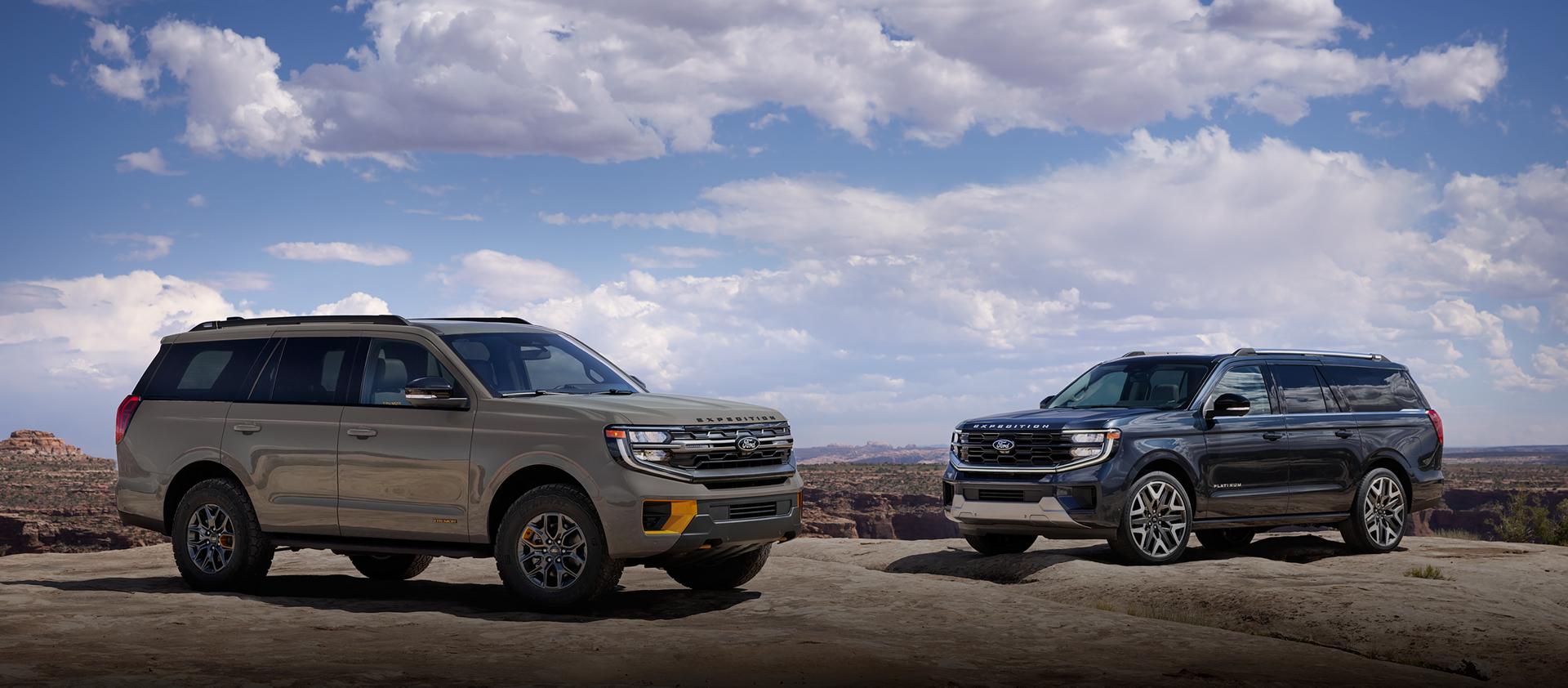 A 2026 Ford Expedition® Tremor® and another Expedition model parked on a rocky outcrop