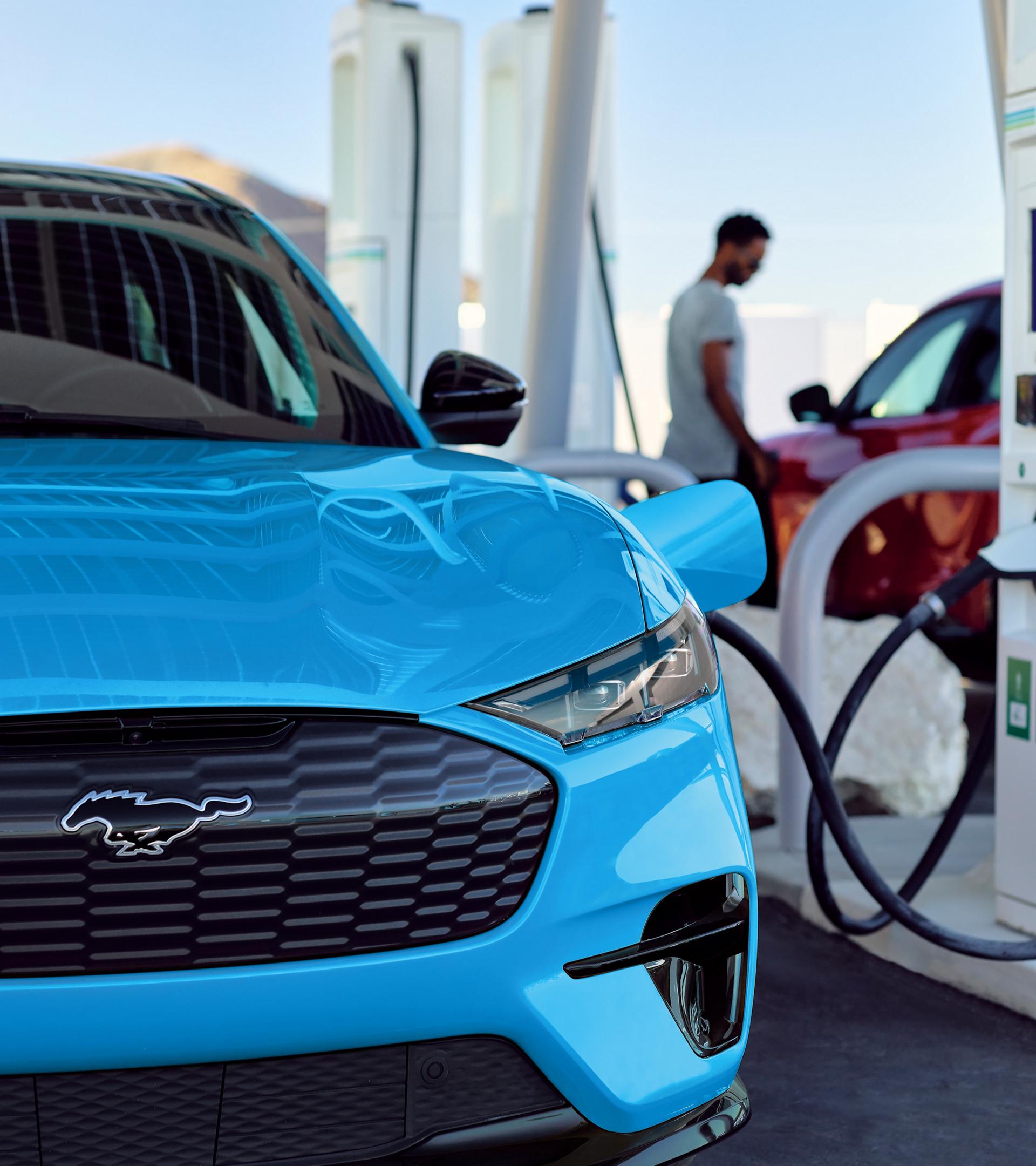 Mustang Mach-E parked at a public charging station.