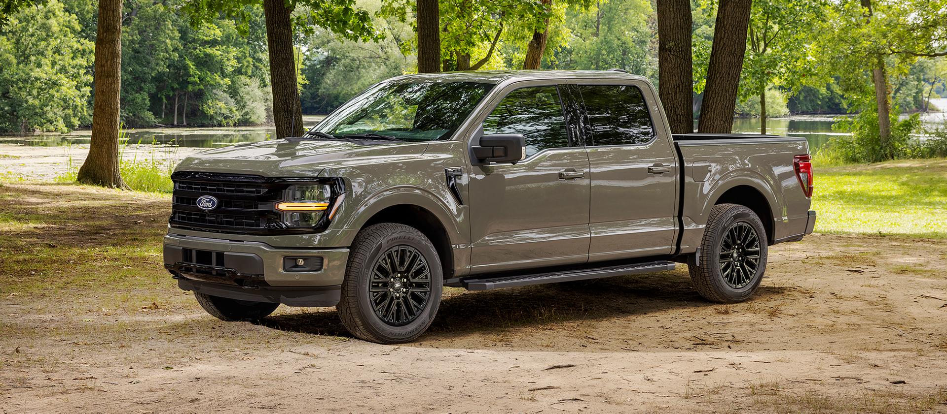 2027 Ford F-150® XLT pickup parked in a wooded area